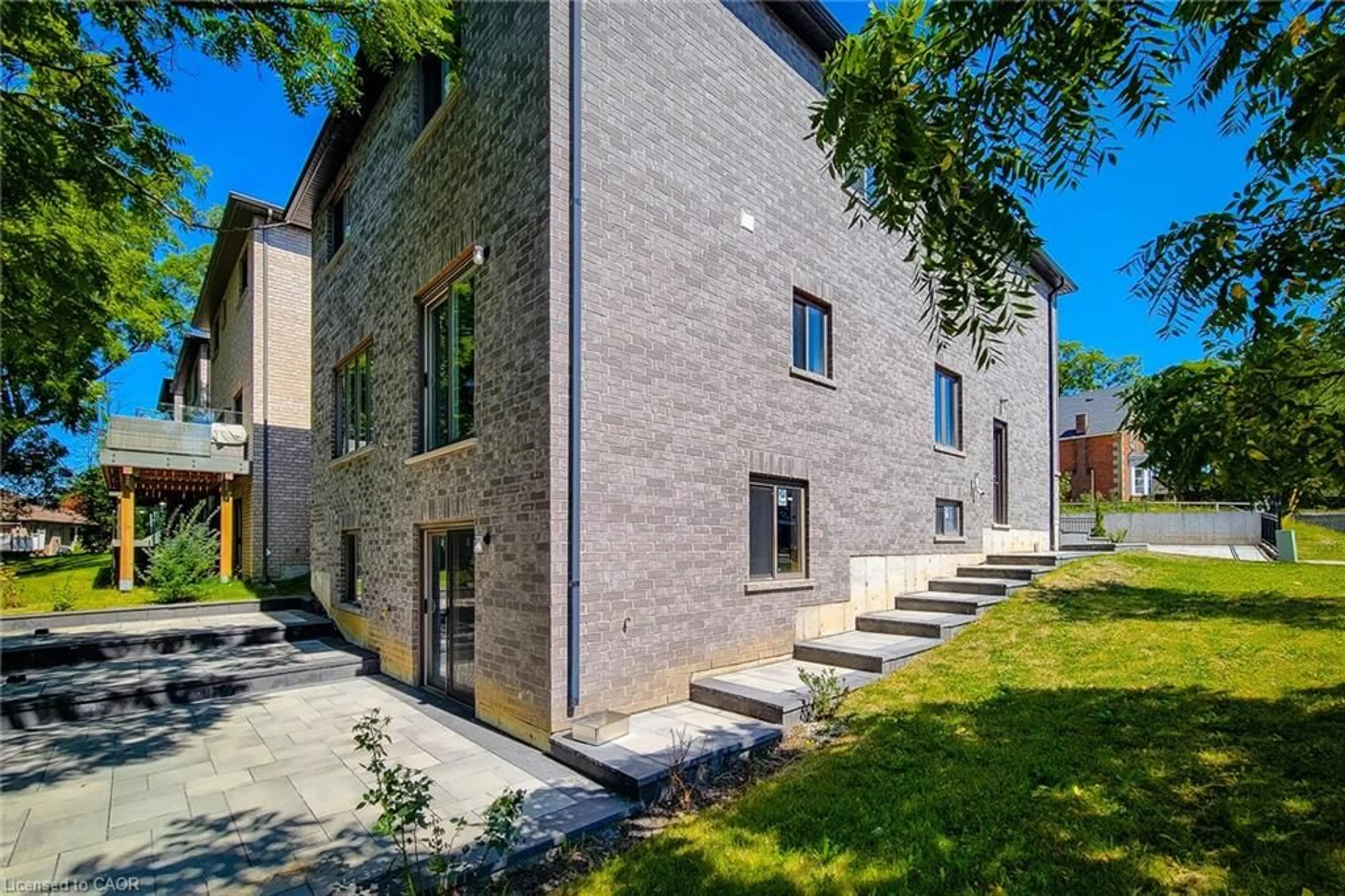 Home with brick exterior material, street for 1261 Mohawk Rd #5, Ancaster Ontario L9G 3K9