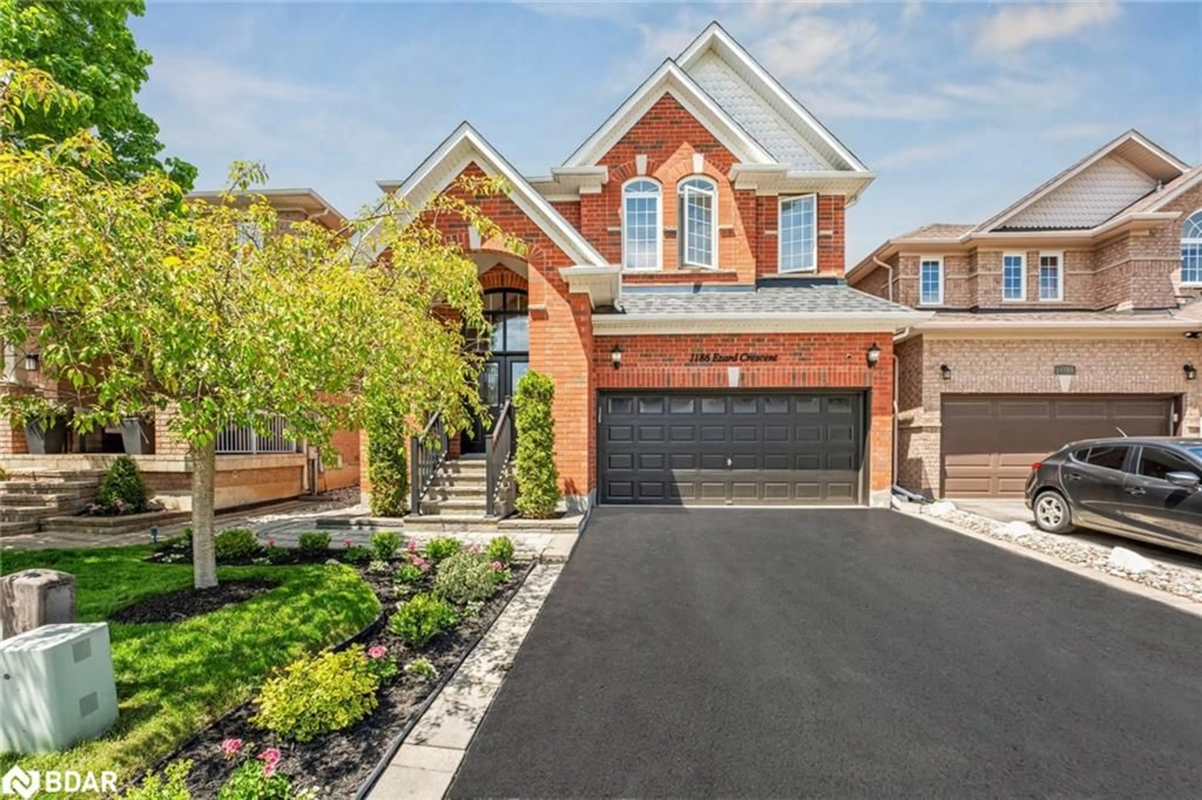 Home with brick exterior material, street for 1186 Ezard Cres, Milton Ontario L9T 6N9