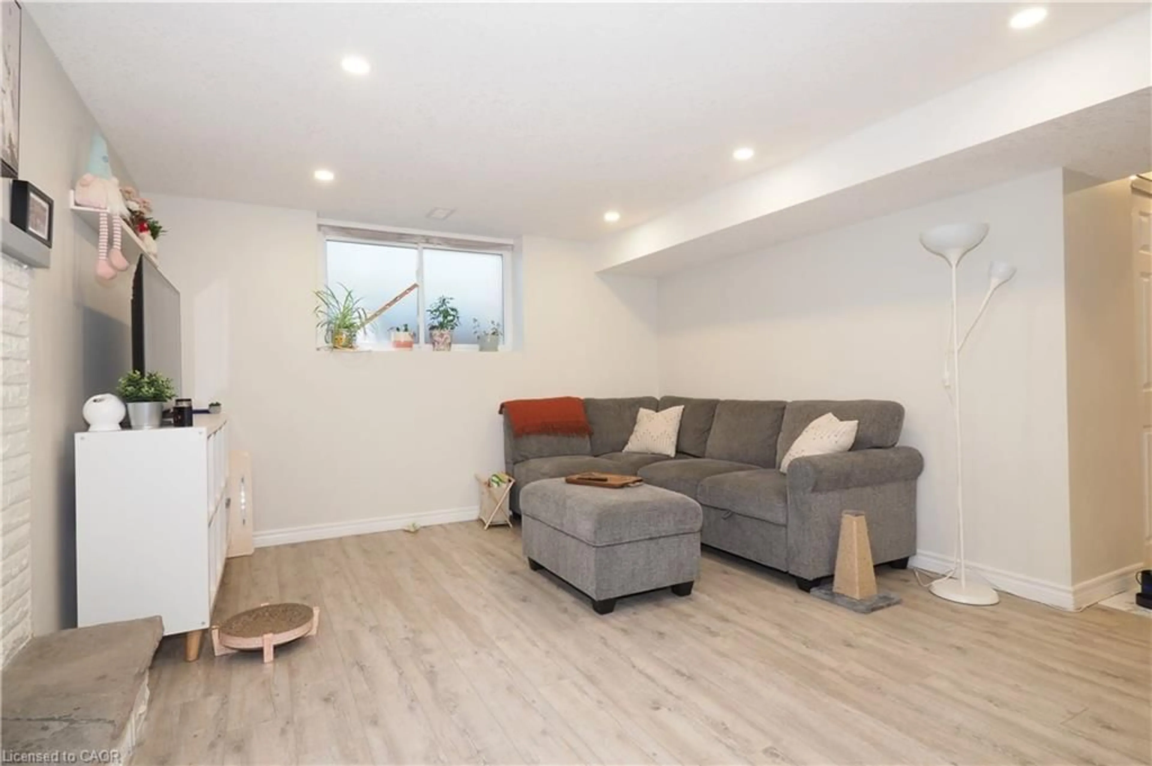 Living room with furniture, wood/laminate floor for 296 Dumfries Ave, Kitchener Ontario N2H 2E8