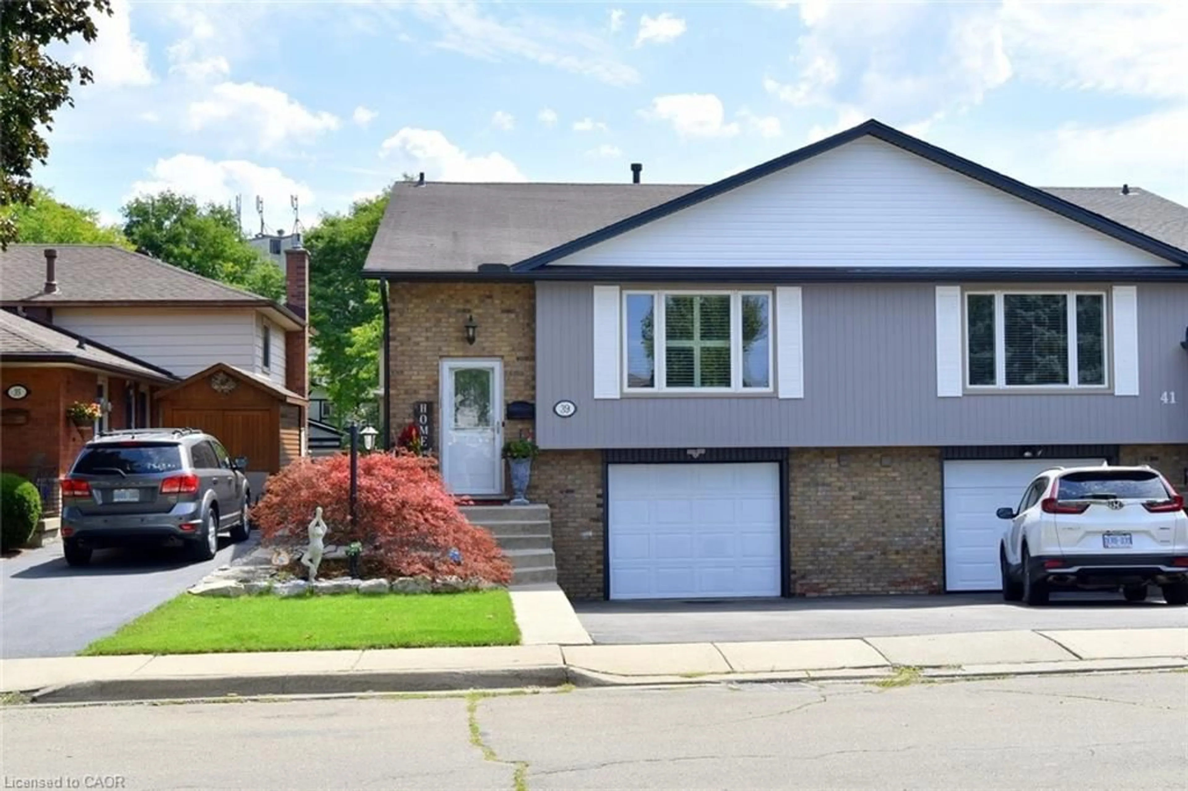 Home with brick exterior material, street for 39 Markson Cres, Hamilton Ontario L8T 4W3