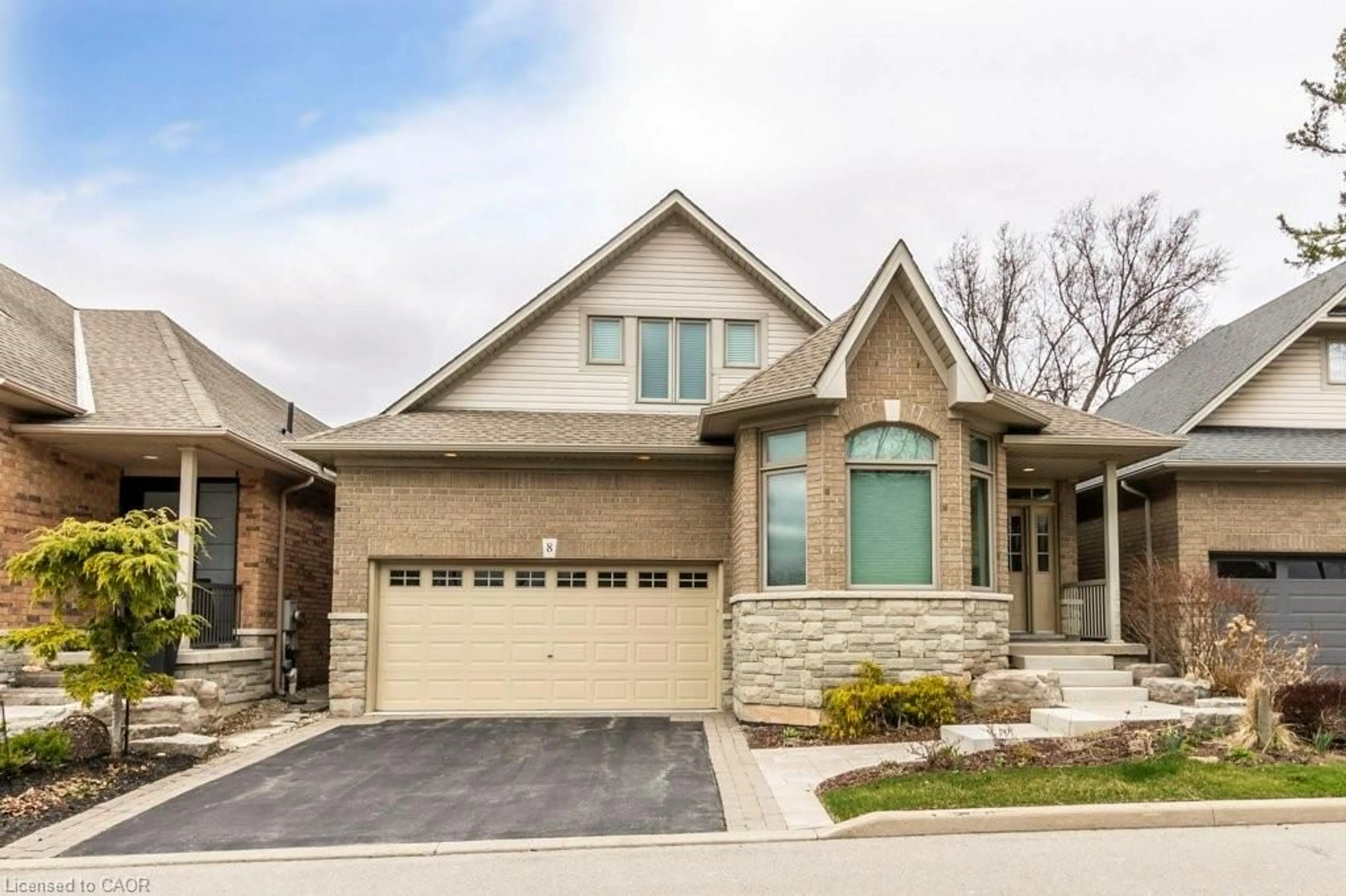 Home with brick exterior material, street for 2141 Caroline St #8, Burlington Ontario L7R 1L7