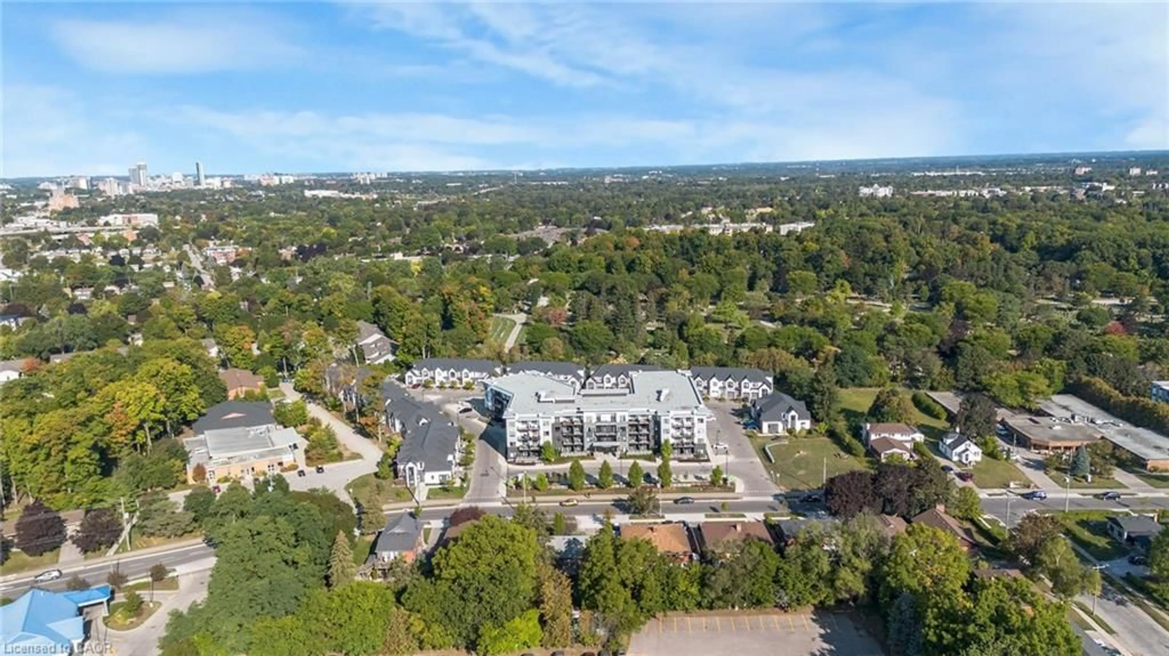 A pic from outside/outdoor area/front of a property/back of a property/a pic from drone, unknown for 110 Fergus Ave #211, Kitchener Ontario N2A 0K9