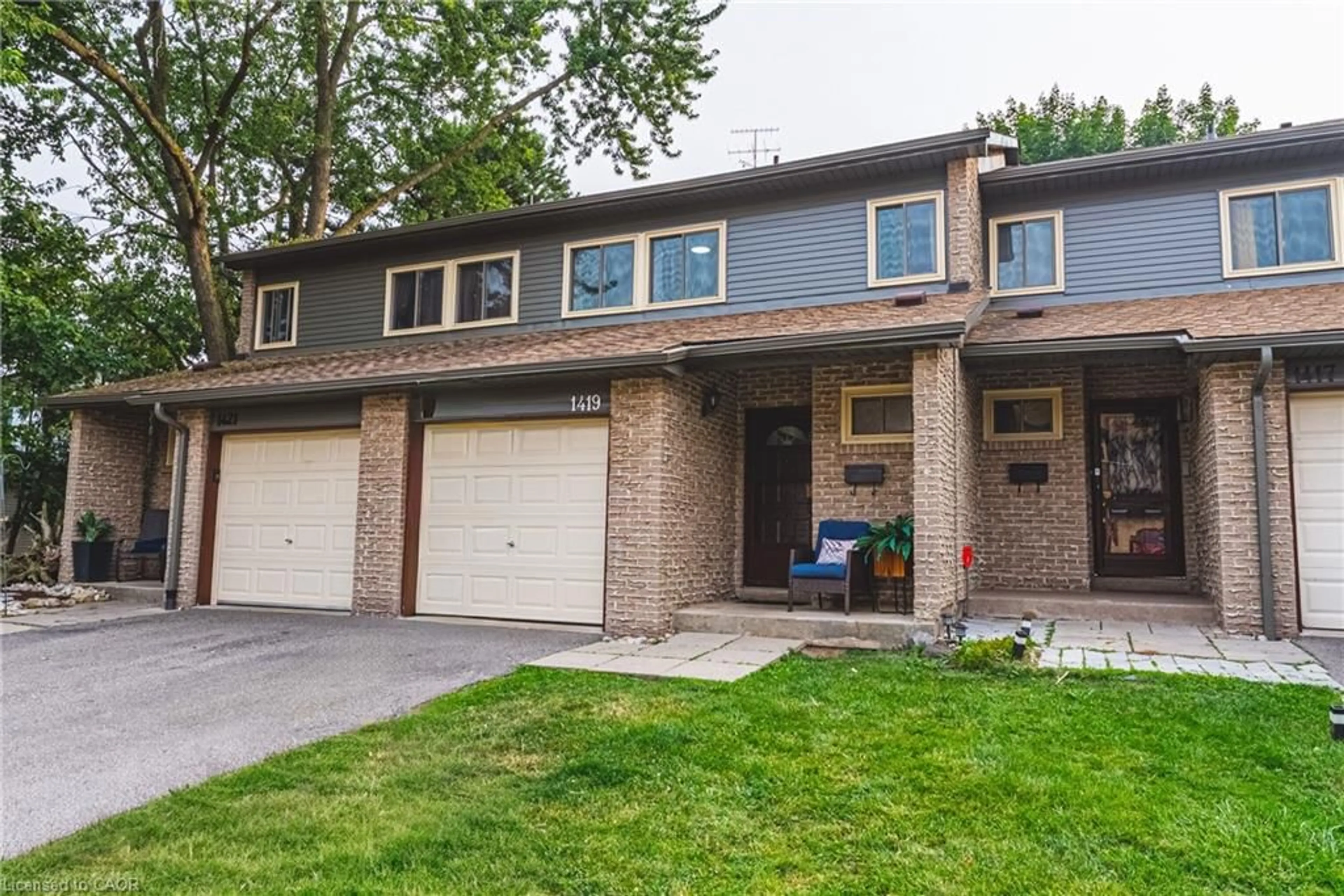 Home with brick exterior material, street for 1419 Ester Dr, Burlington Ontario L7P 1L5