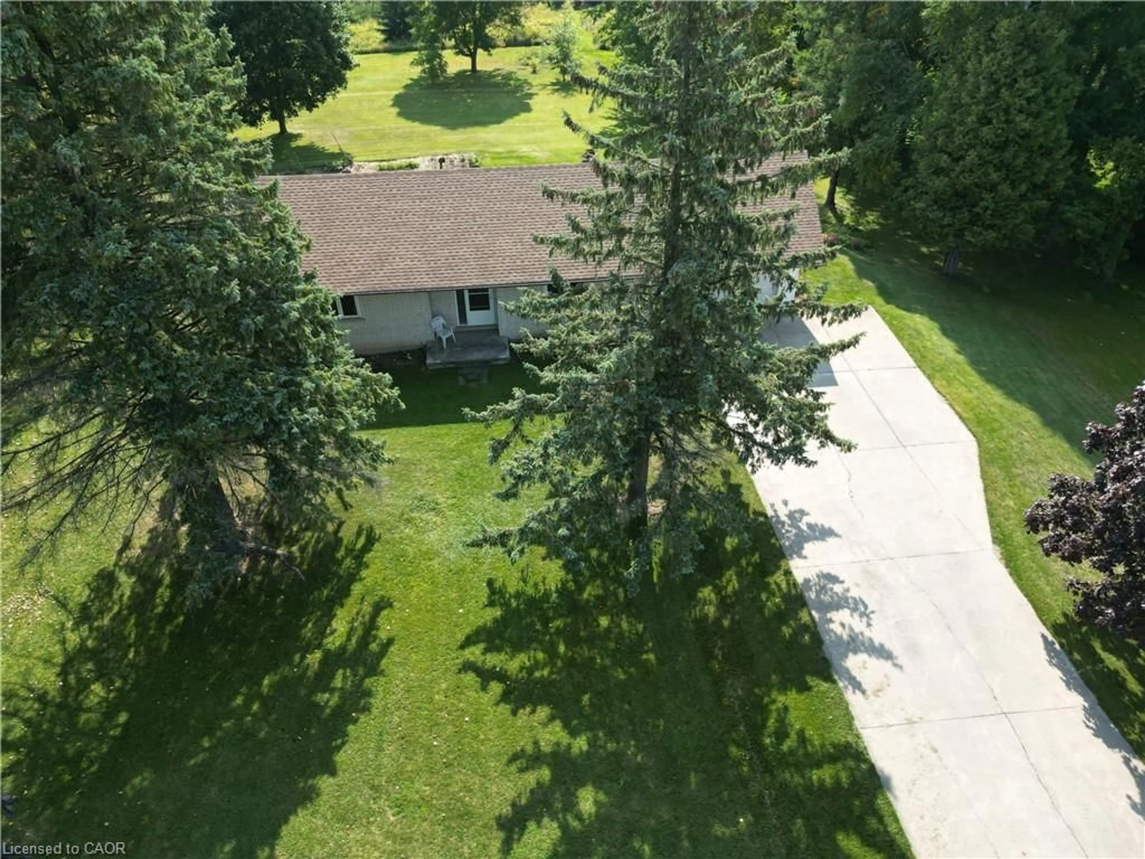 A pic from outside/outdoor area/front of a property/back of a property/a pic from drone, forest/trees view for 7321 Wellington Rd 11, Drayton Ontario N0G 1P0