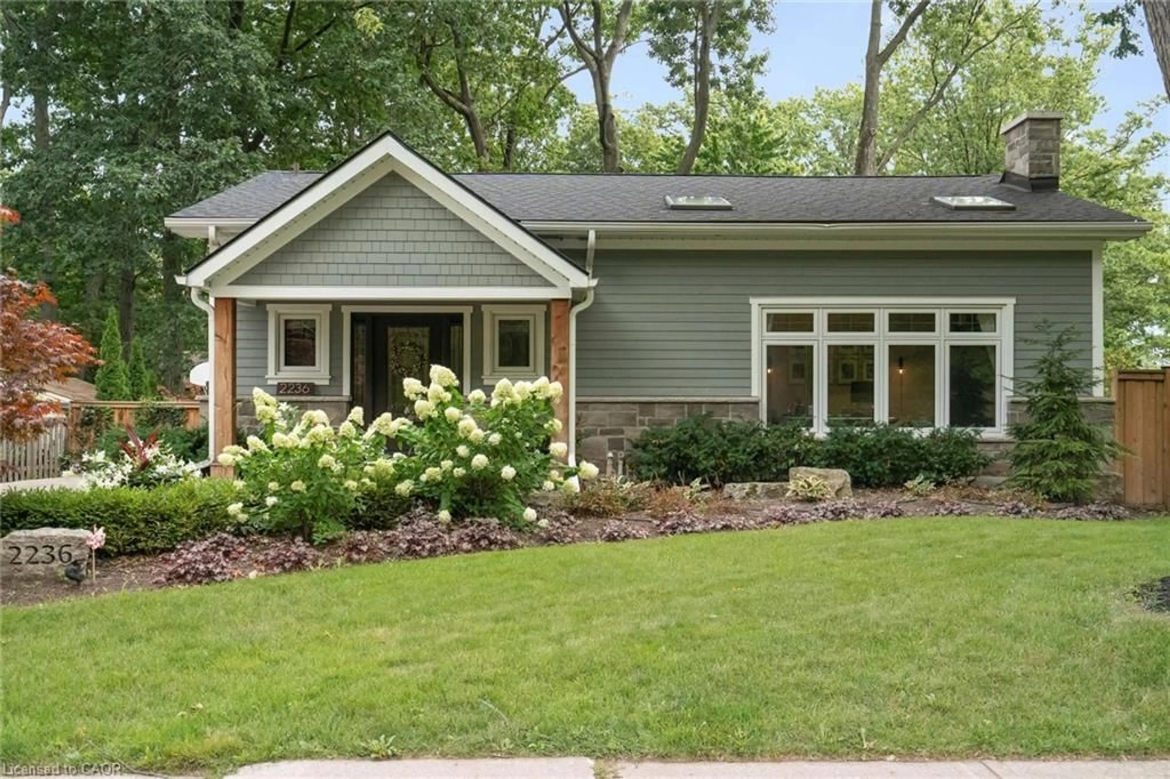 Home with vinyl exterior material, street for 2236 Mount Forest Dr, Burlington Ontario L7P 1J1