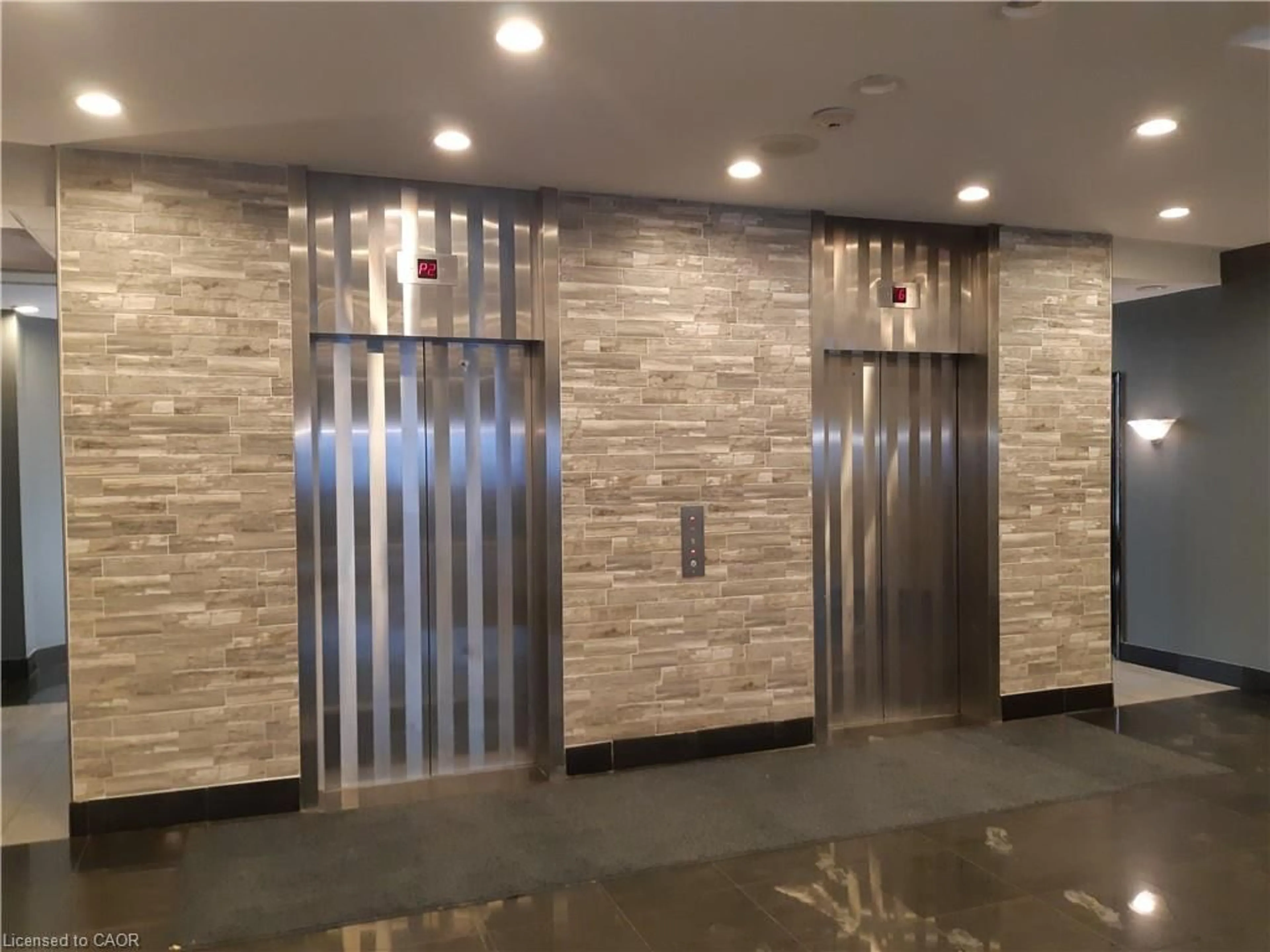 Indoor foyer for 135 James St #214, Hamilton Ontario L8P 2Z6