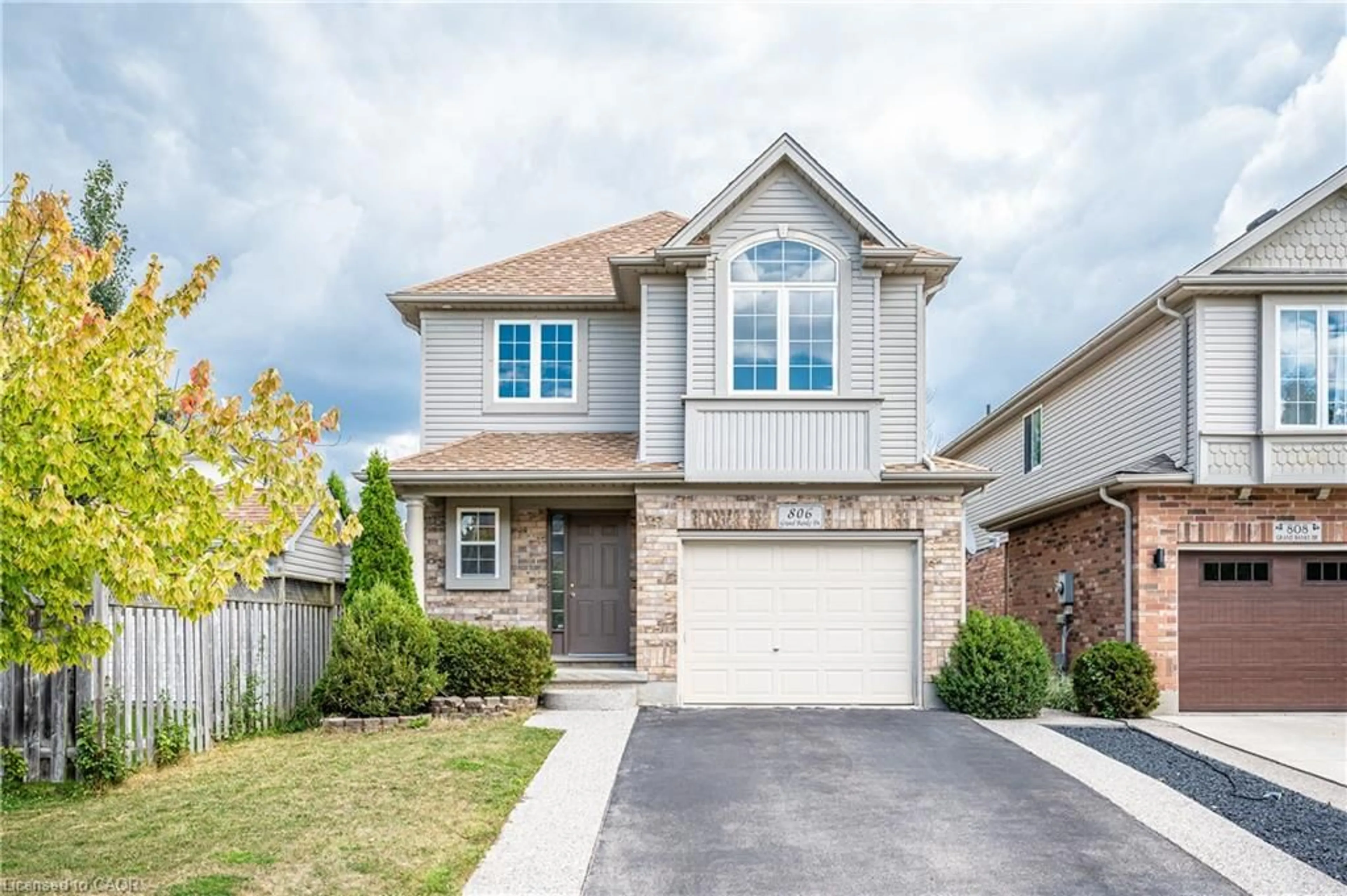 Home with brick exterior material, street for 806 Grand Banks Dr, Waterloo Ontario N2K 4N6