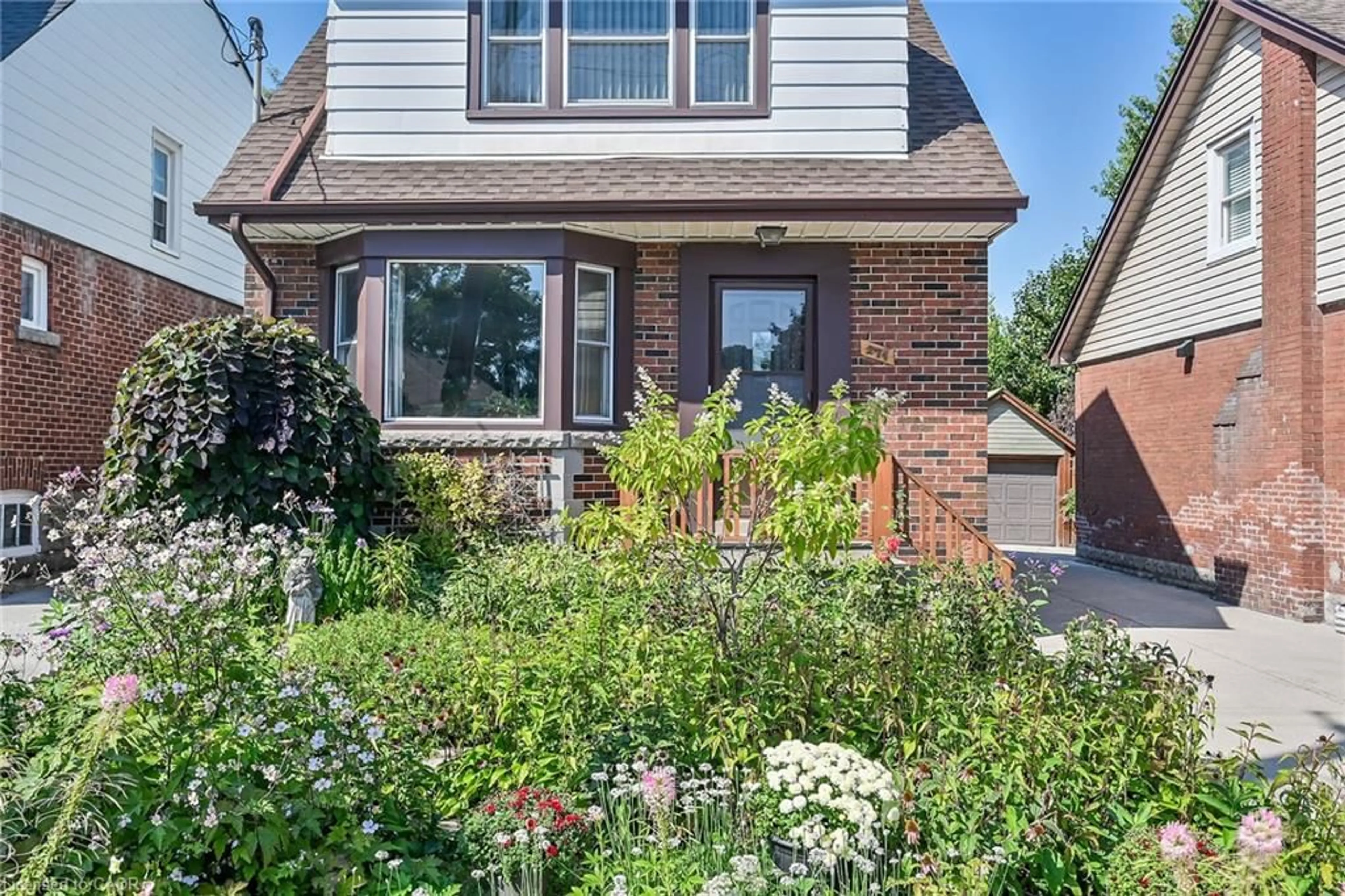 Home with brick exterior material, street for 274 Ottawa St, Hamilton Ontario L8K 2G1