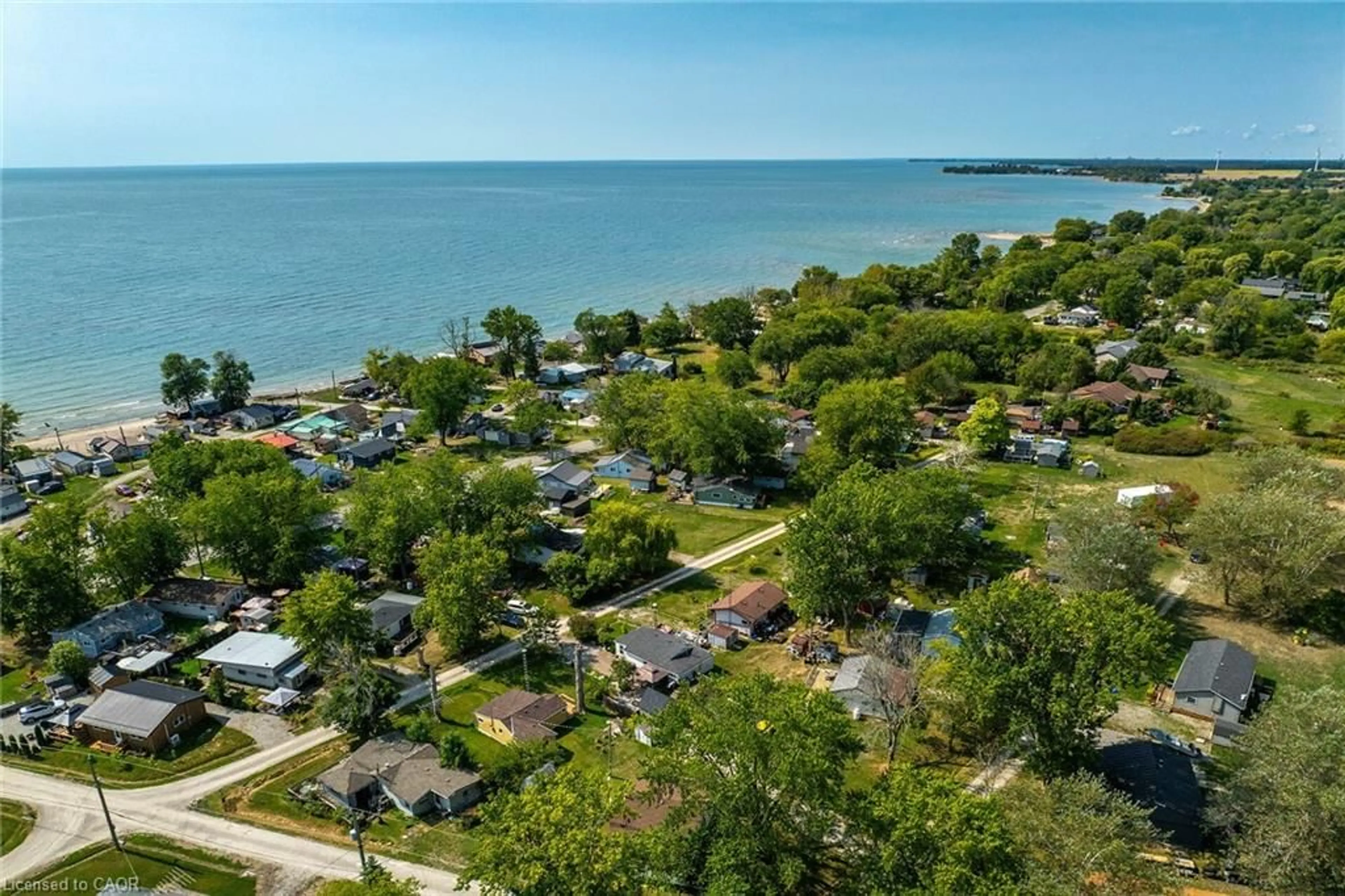 A pic from outside/outdoor area/front of a property/back of a property/a pic from drone, water/lake/river/ocean view for 17 Maple Lane, Rainham Ontario N0A 1P0