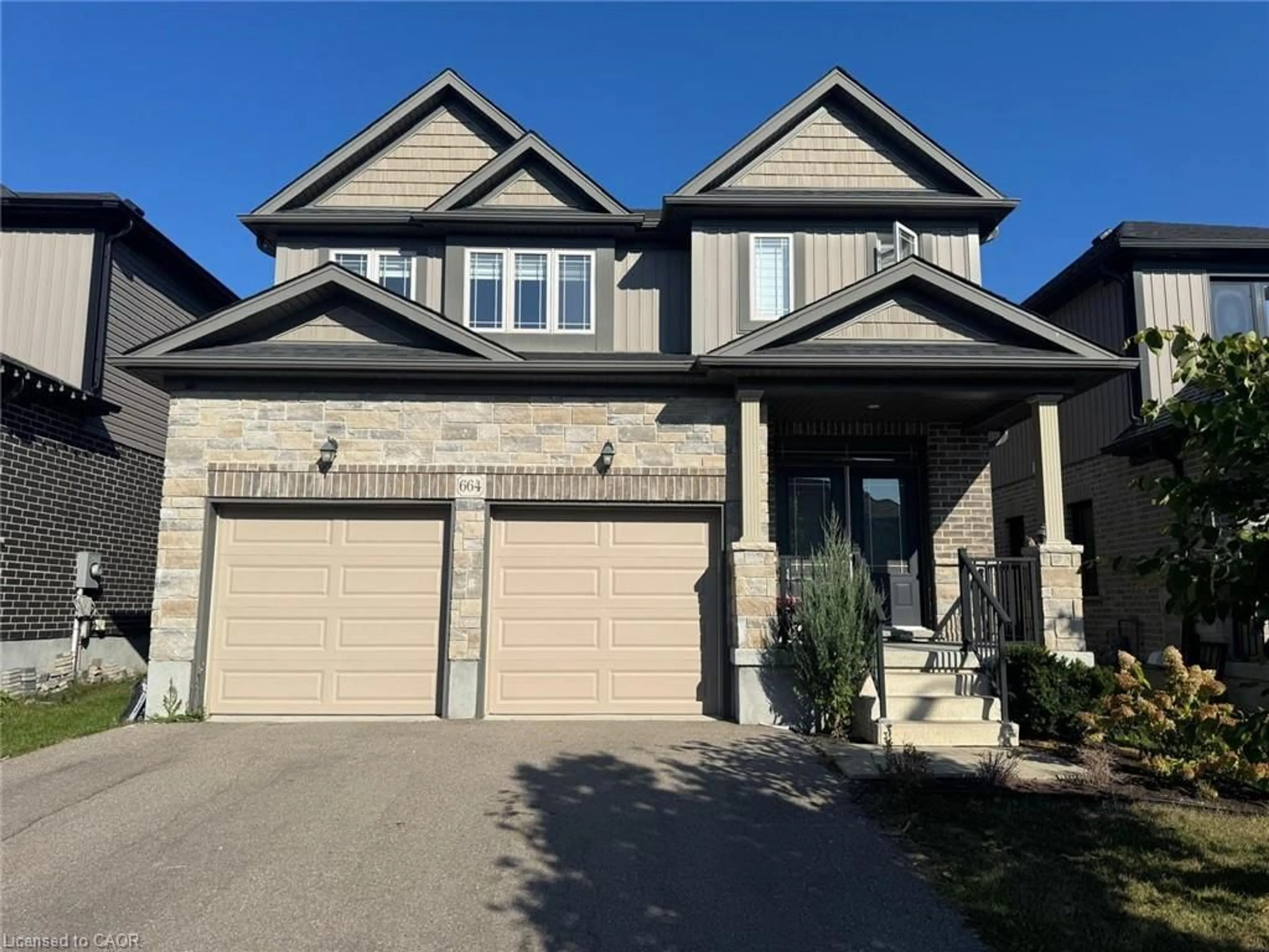 Home with brick exterior material, street for 664 Indian Grass St, Waterloo Ontario N2V 0C9