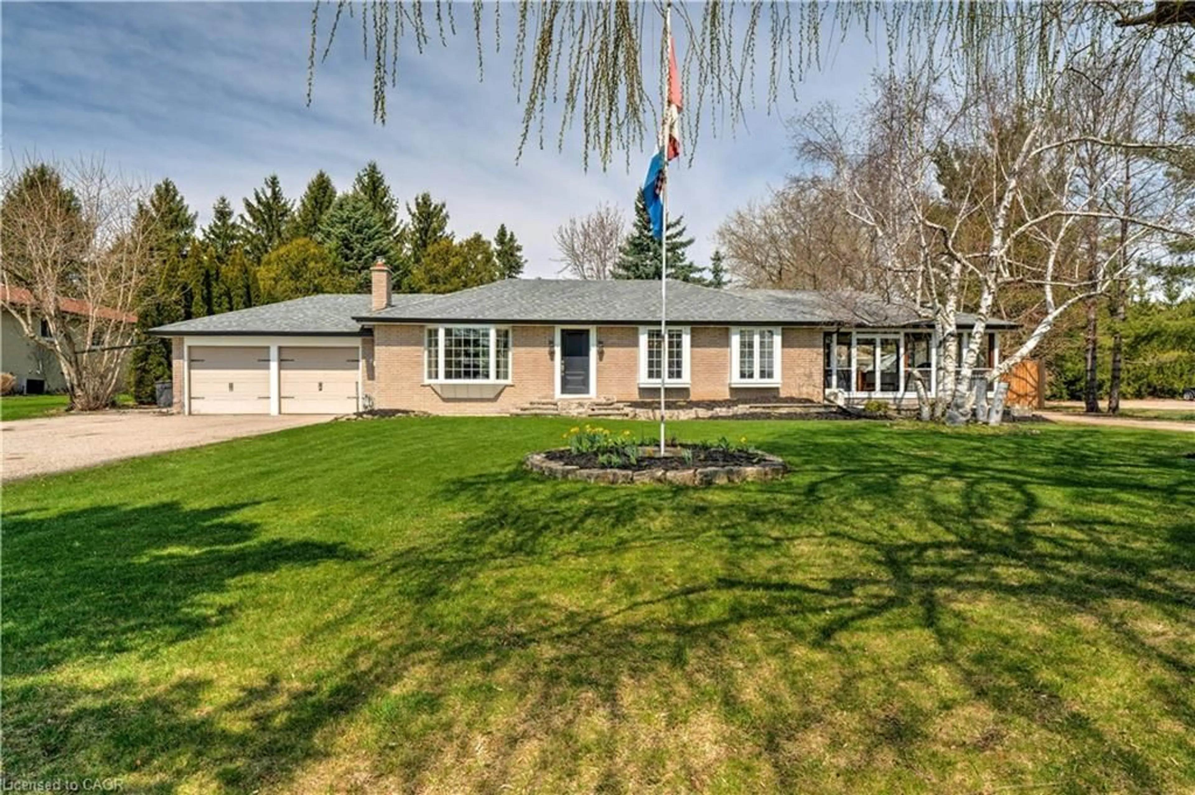 A pic from outside/outdoor area/front of a property/back of a property/a pic from drone, unknown for 13175 15 Side Road, Georgetown Ontario L7G 4S5
