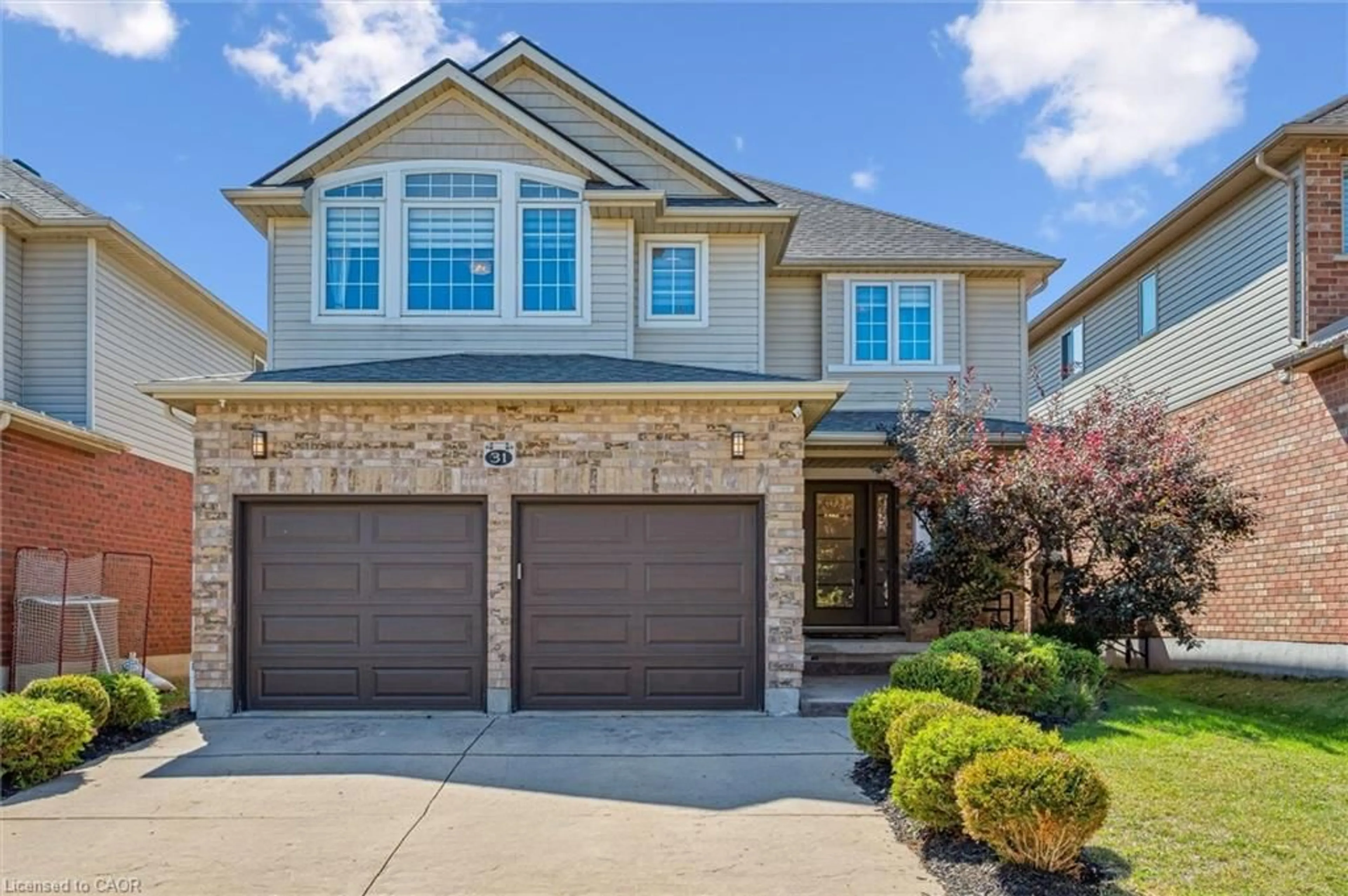 Home with brick exterior material, street for 31 Cranbrook St, Kitchener Ontario N2P 2W5