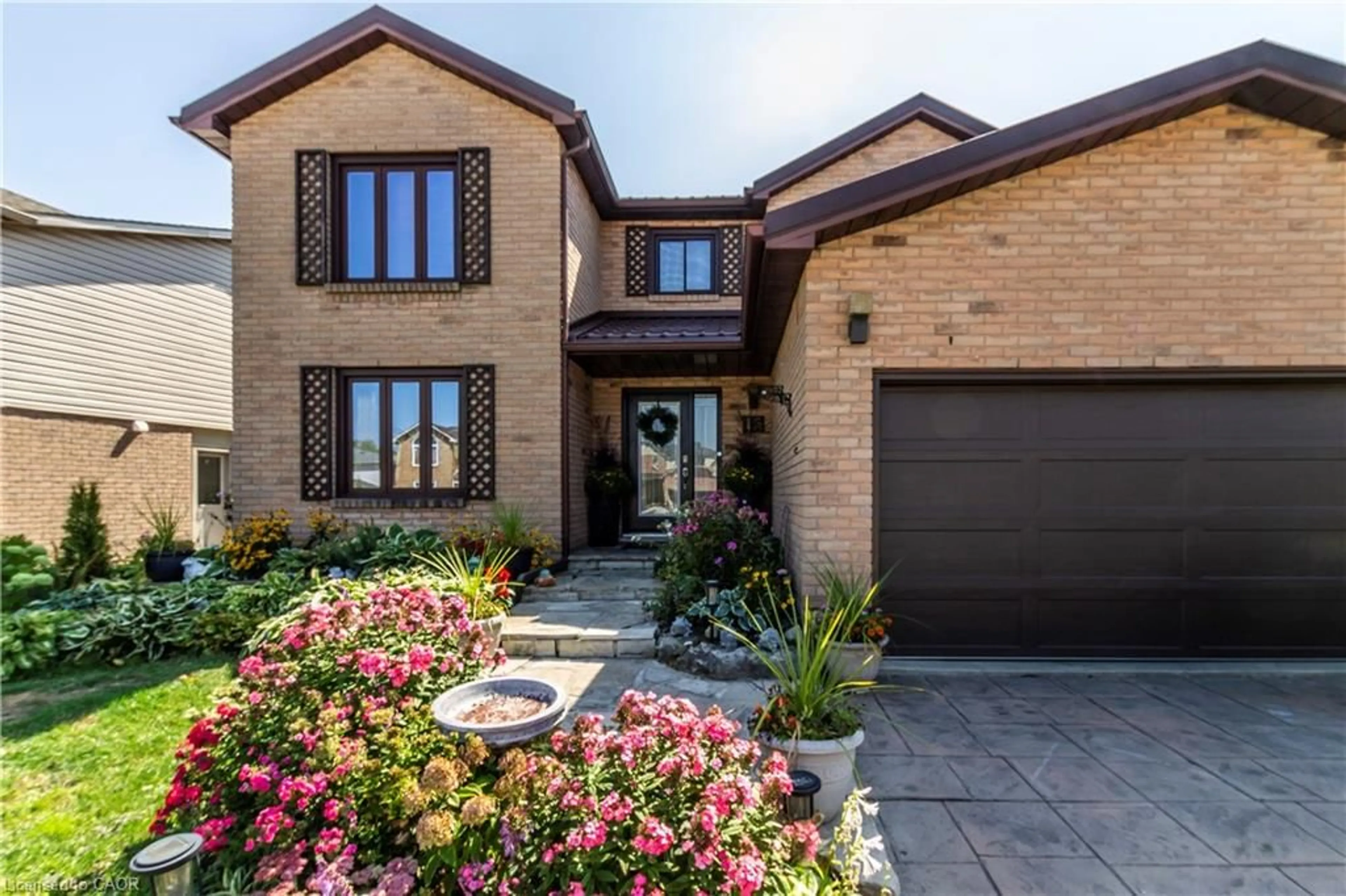 Home with brick exterior material, street for 15 Bourbon Crt, Hamilton Ontario L9B 2E9