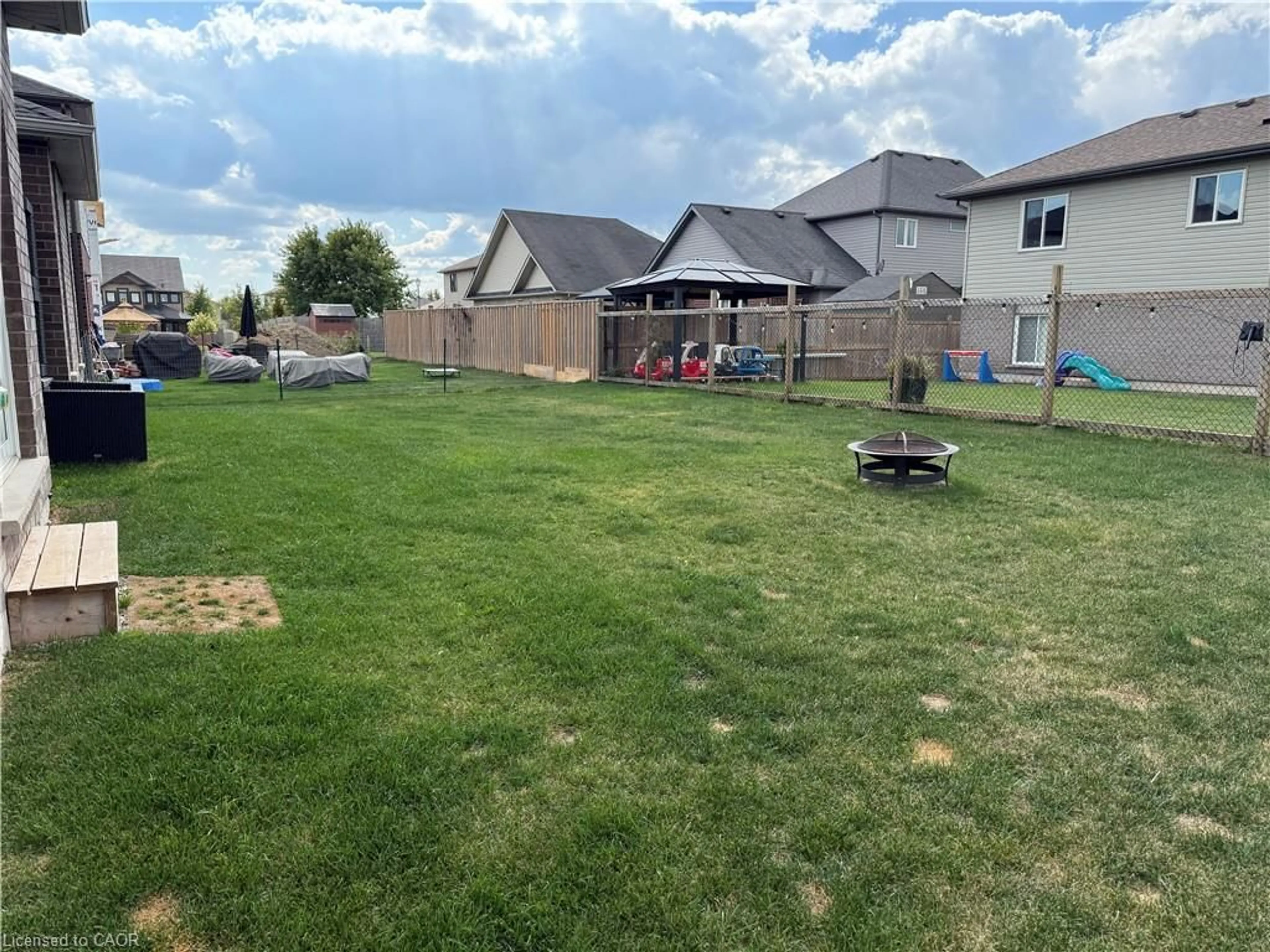 A pic from outside/outdoor area/front of a property/back of a property/a pic from drone, unknown for 115 Maple St, Drayton Ontario N0G 1P0
