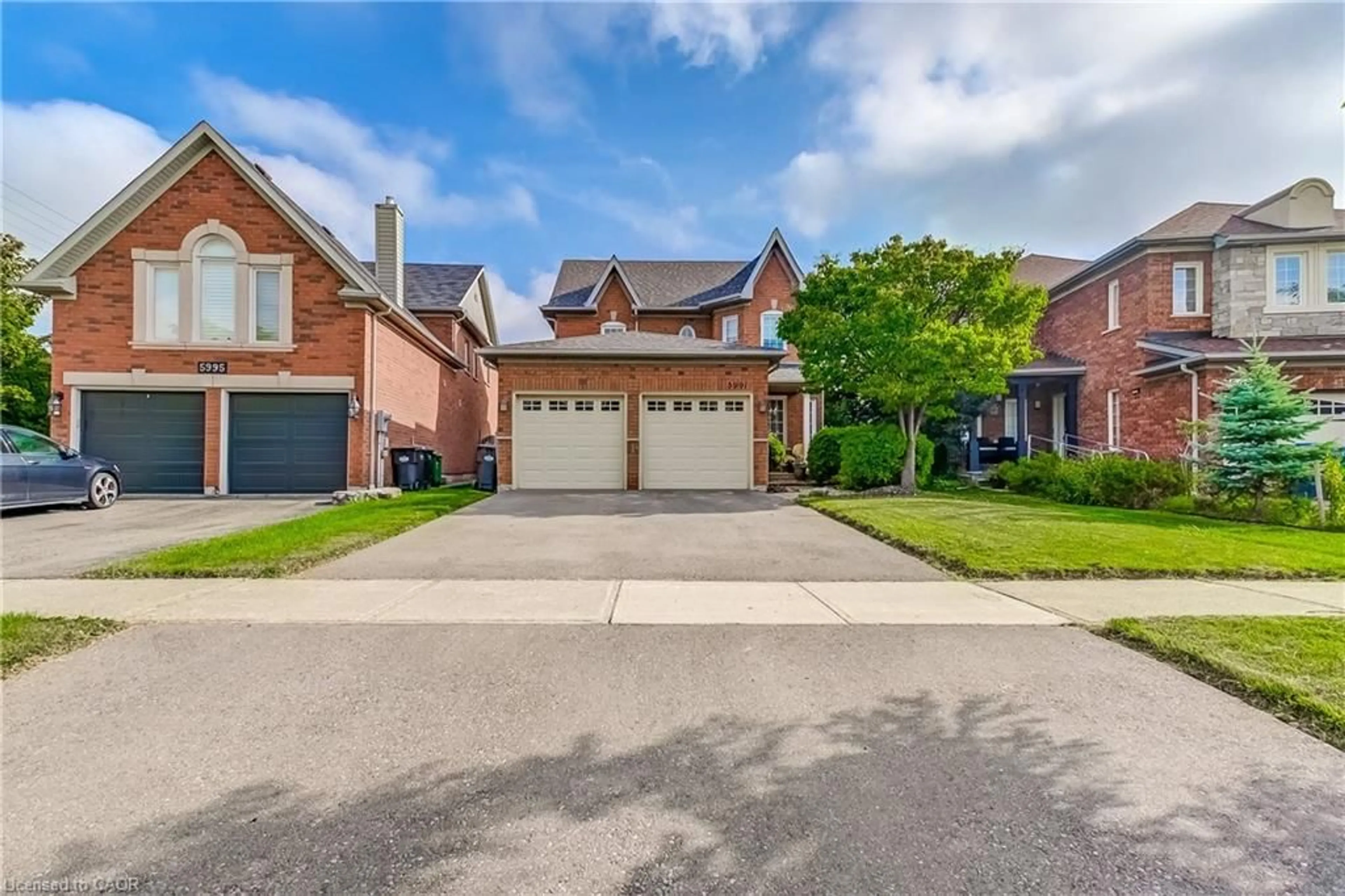 Home with brick exterior material, street for 5991 Greensboro Dr, Mississauga Ontario L5M 5S5