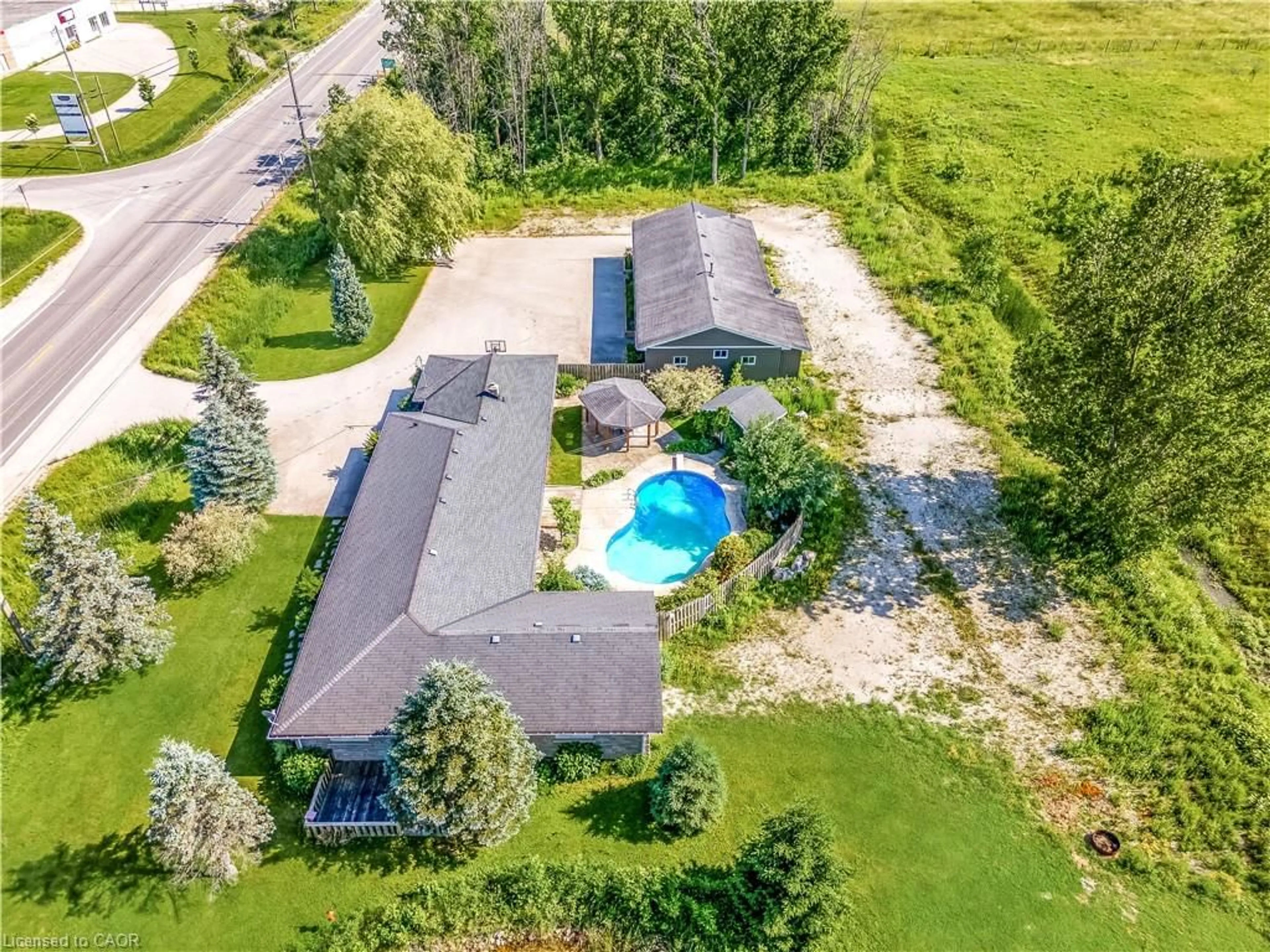 A pic from outside/outdoor area/front of a property/back of a property/a pic from drone, water/lake/river/ocean view for 717906 Highway 6, Owen Sound Ontario N4K 5N7