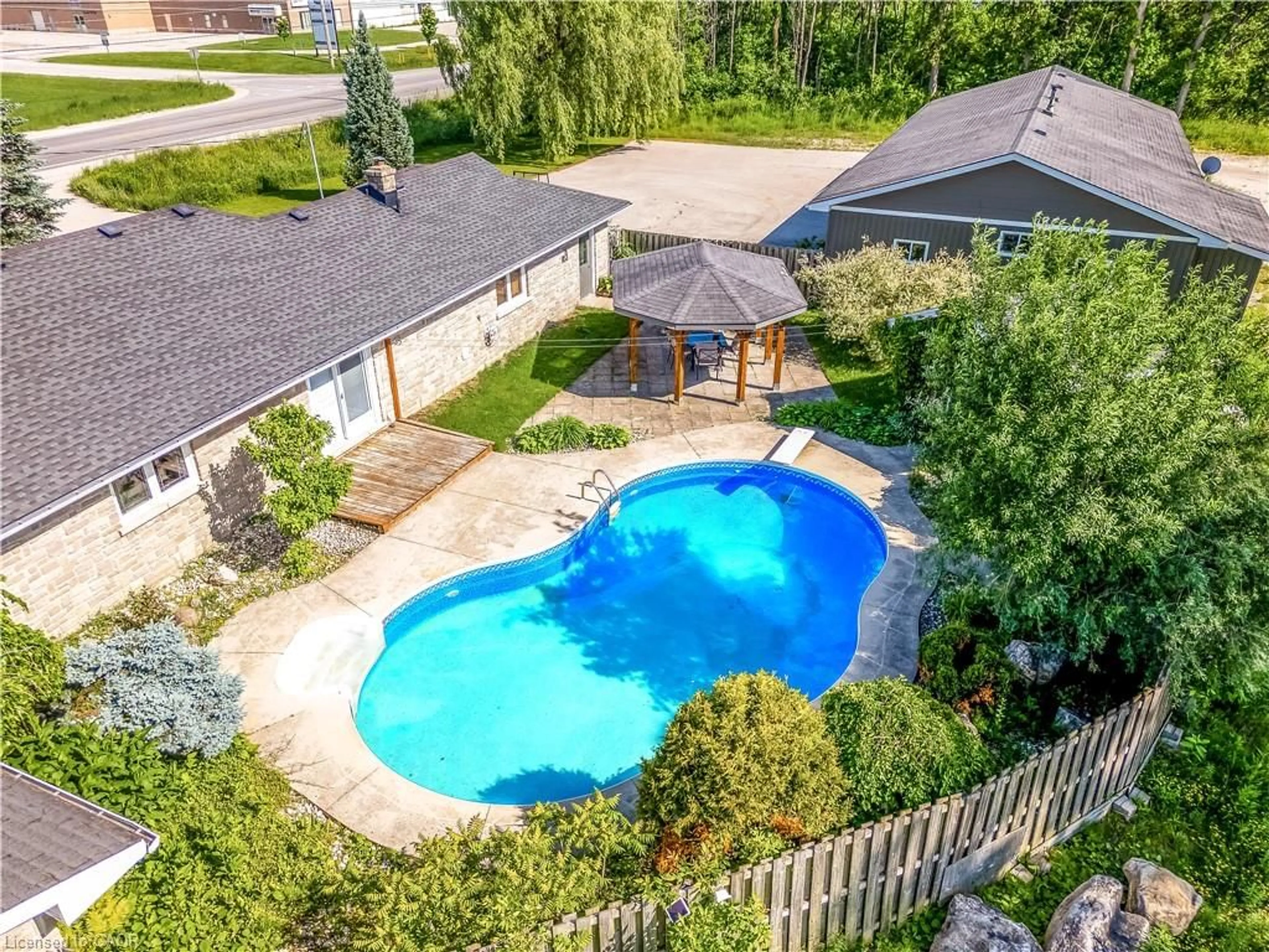 A pic from outside/outdoor area/front of a property/back of a property/a pic from drone, water/lake/river/ocean view for 717906 Highway 6, Owen Sound Ontario N4K 5N7