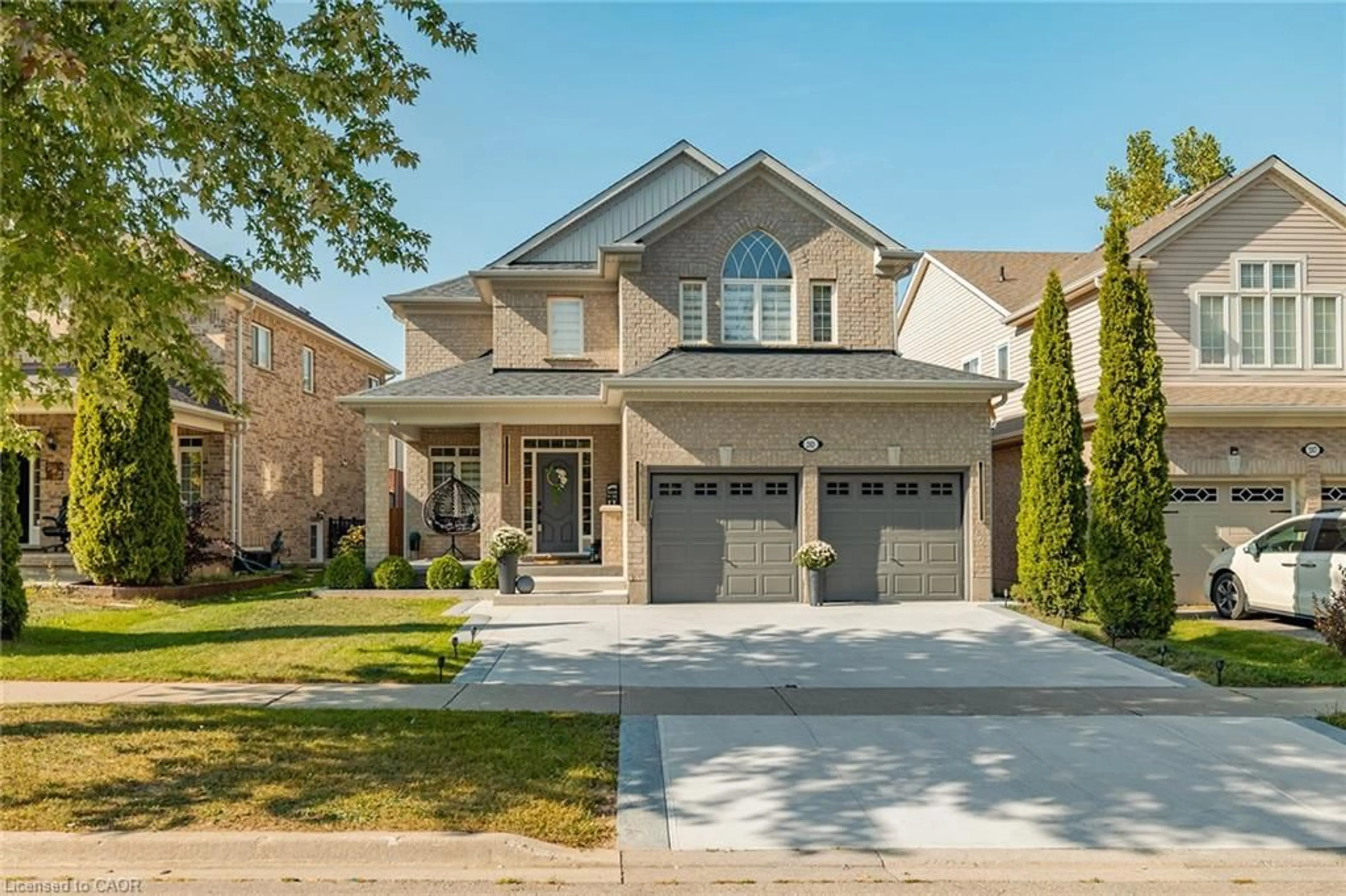 Home with brick exterior material, street for 243 Sims Estate Dr, Kitchener Ontario N2A 4L4