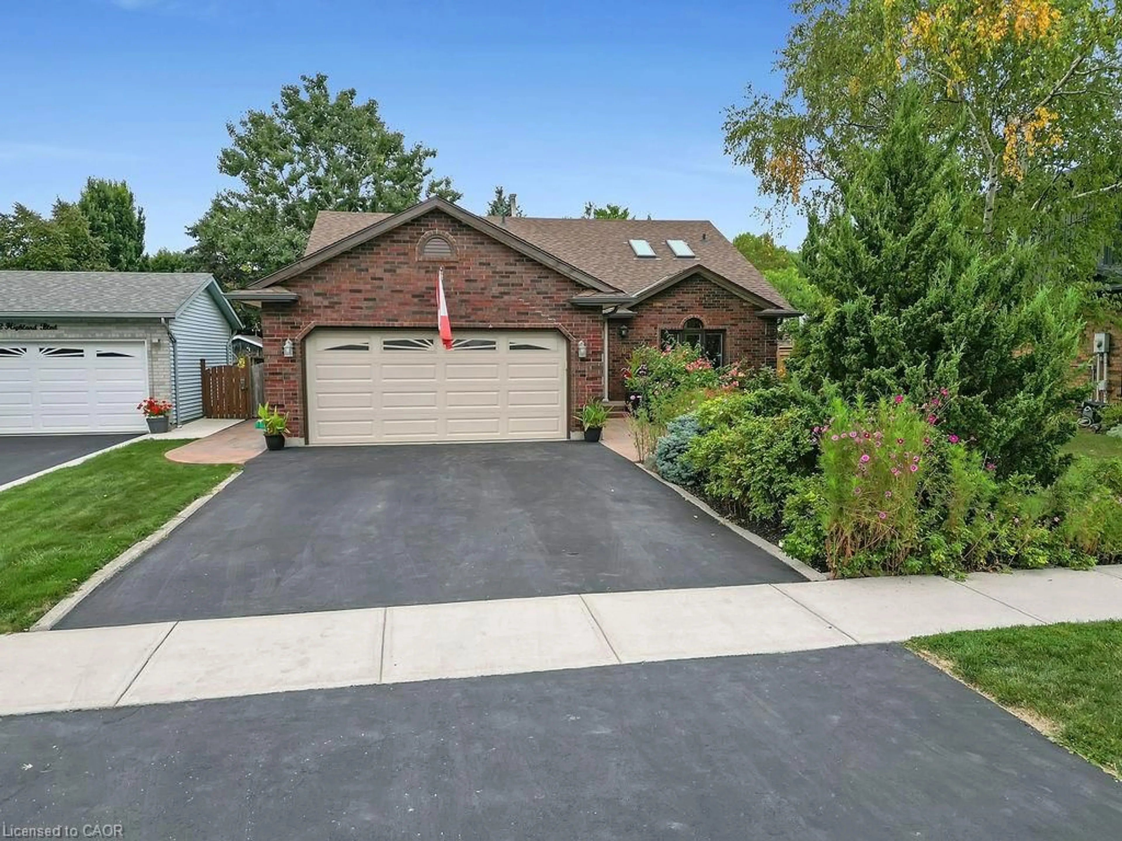 Home with brick exterior material, street for 30 Highland Blvd, Caledonia Ontario N4W 1G6