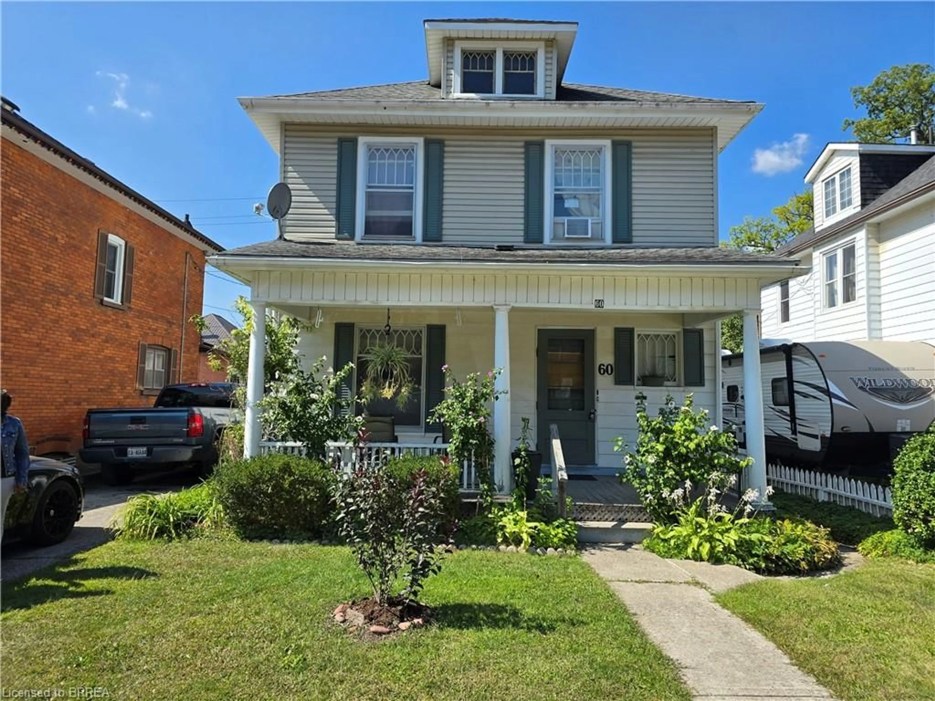 Home with vinyl exterior material, street for 60 Lynnwood Ave, Simcoe Ontario N3Y 2V6