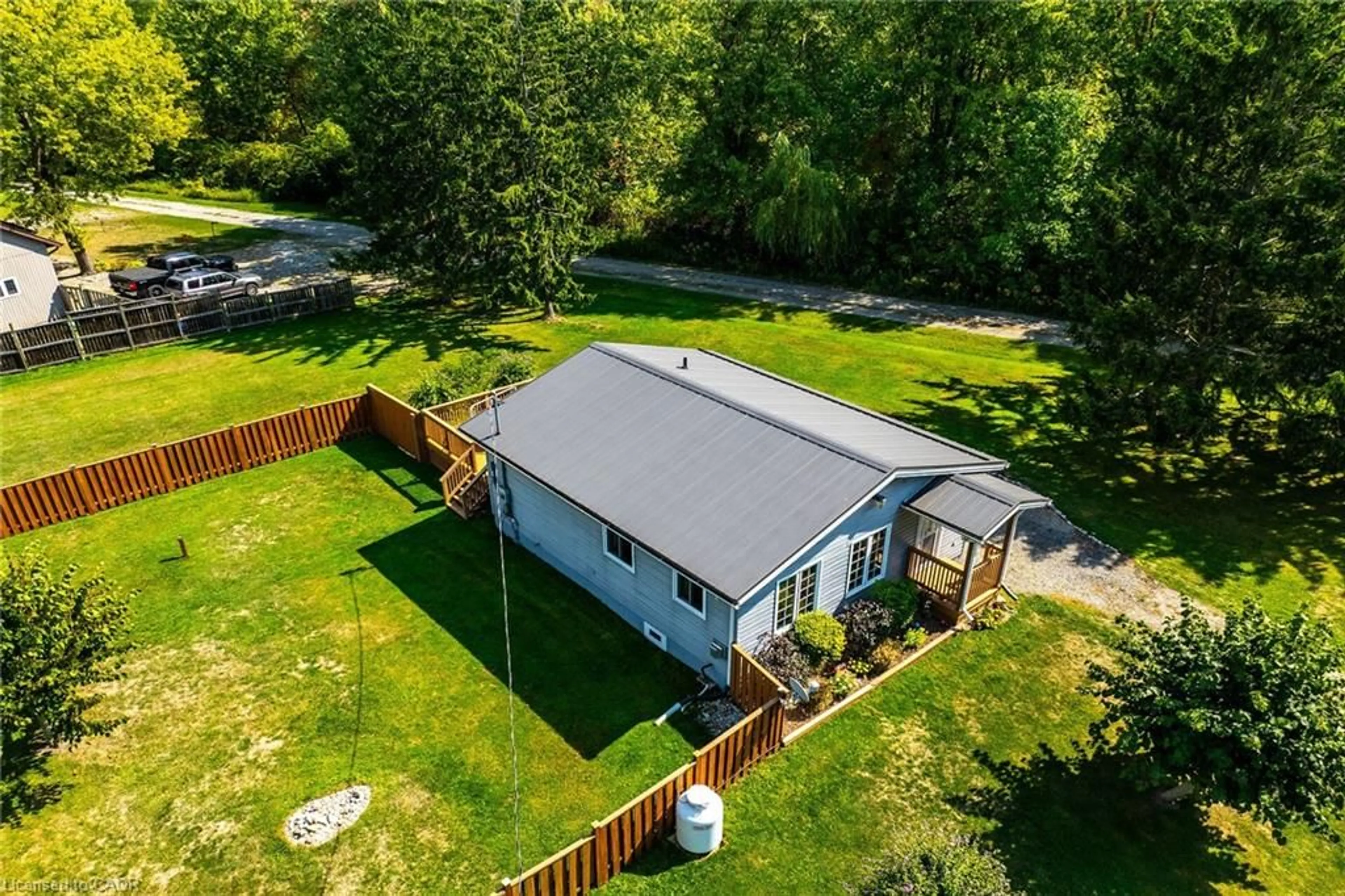 A pic from outside/outdoor area/front of a property/back of a property/a pic from drone, unknown for 8 Downey Rd, Lowbanks Ontario N0A 1K0