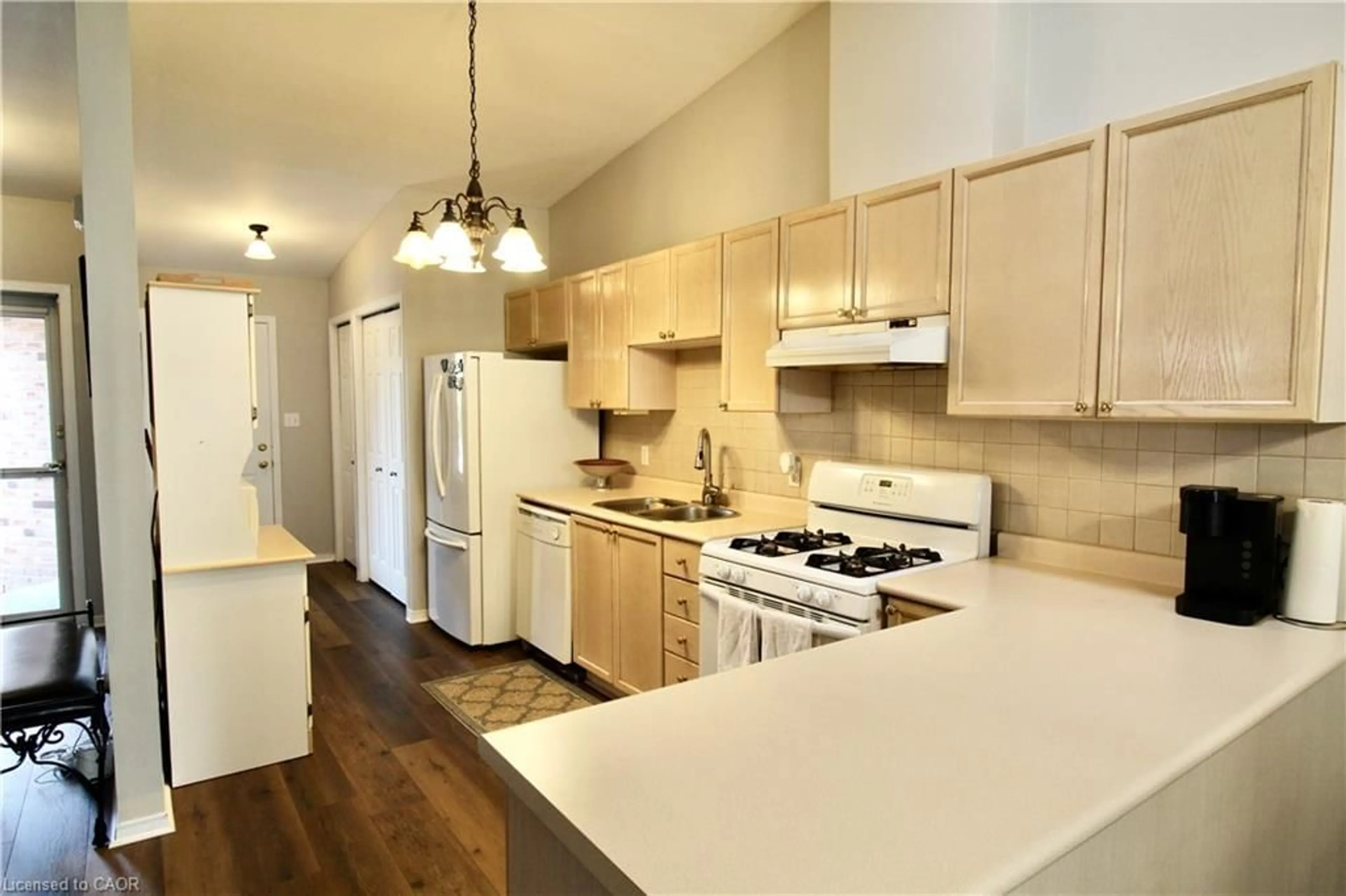 Open concept kitchen, wood/laminate floor for 4451 Michael Ave, Beamsville Ontario L3J 0E2
