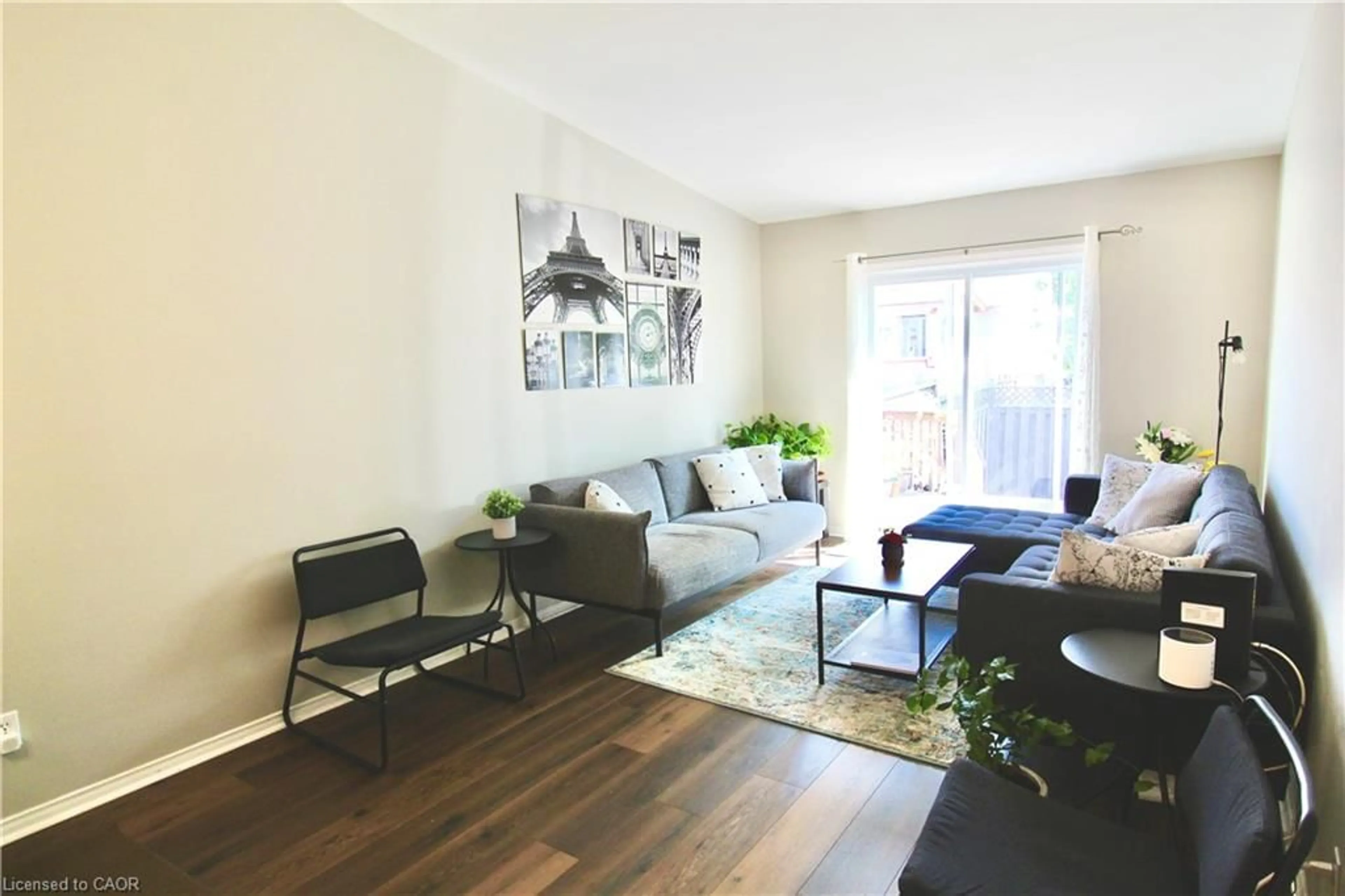 Living room with furniture, wood/laminate floor for 4451 Michael Ave, Beamsville Ontario L3J 0E2