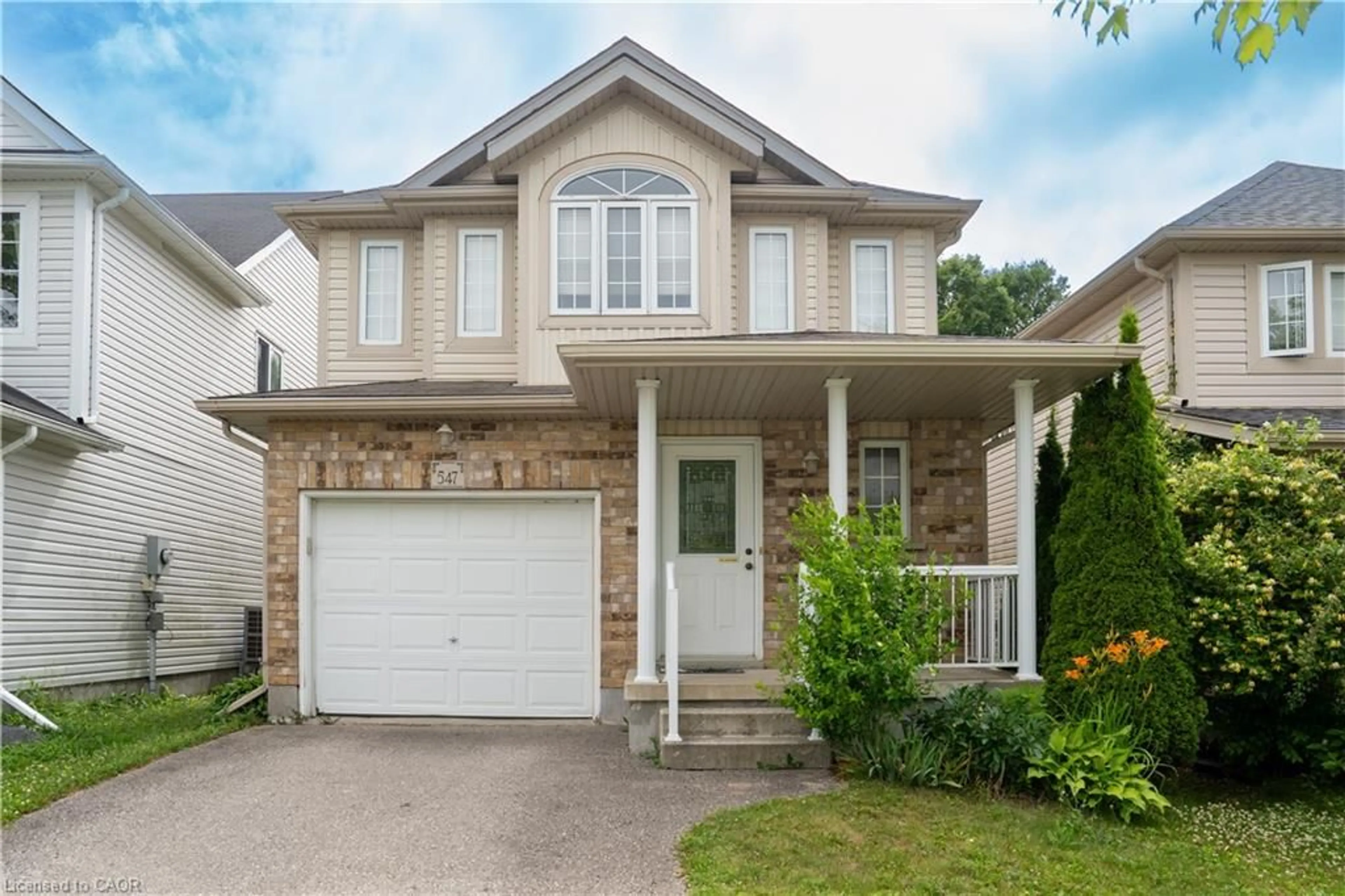 Home with vinyl exterior material, street for 547 Blue Beech Blvd, Waterloo Ontario N2V 2T4
