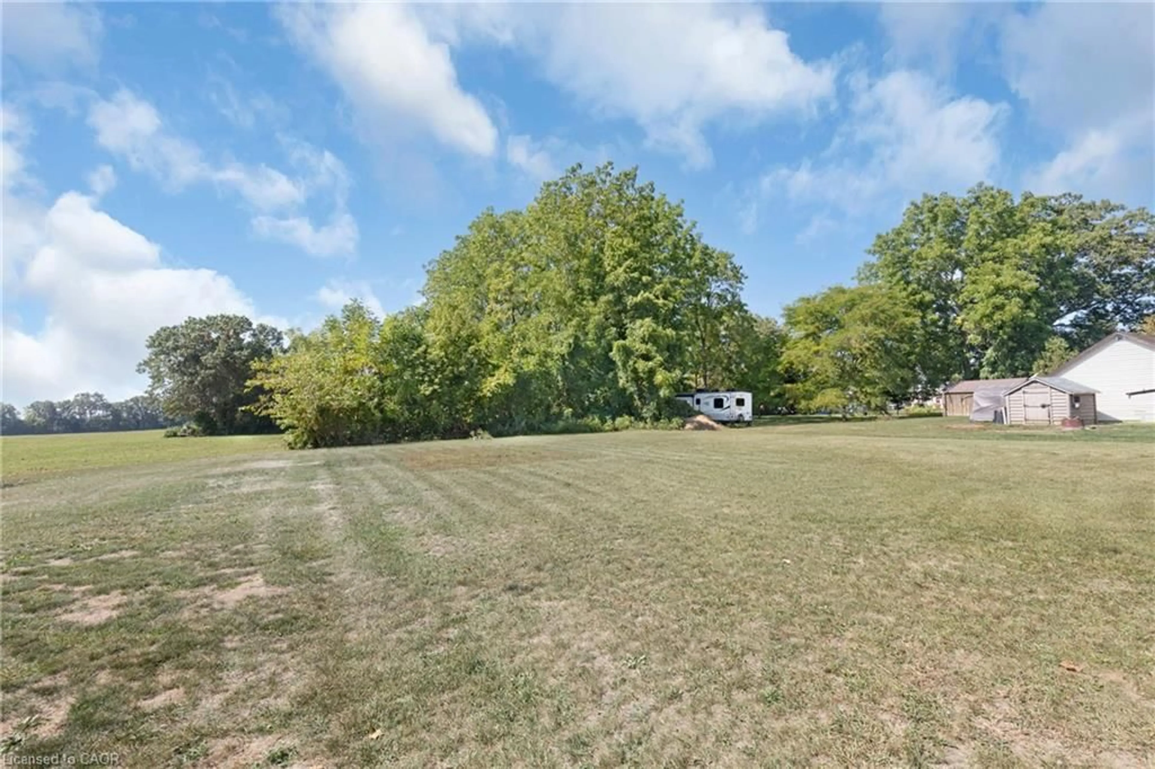A pic from outside/outdoor area/front of a property/back of a property/a pic from drone, forest/trees view for 13 George St, Langton Ontario N4G 3S8