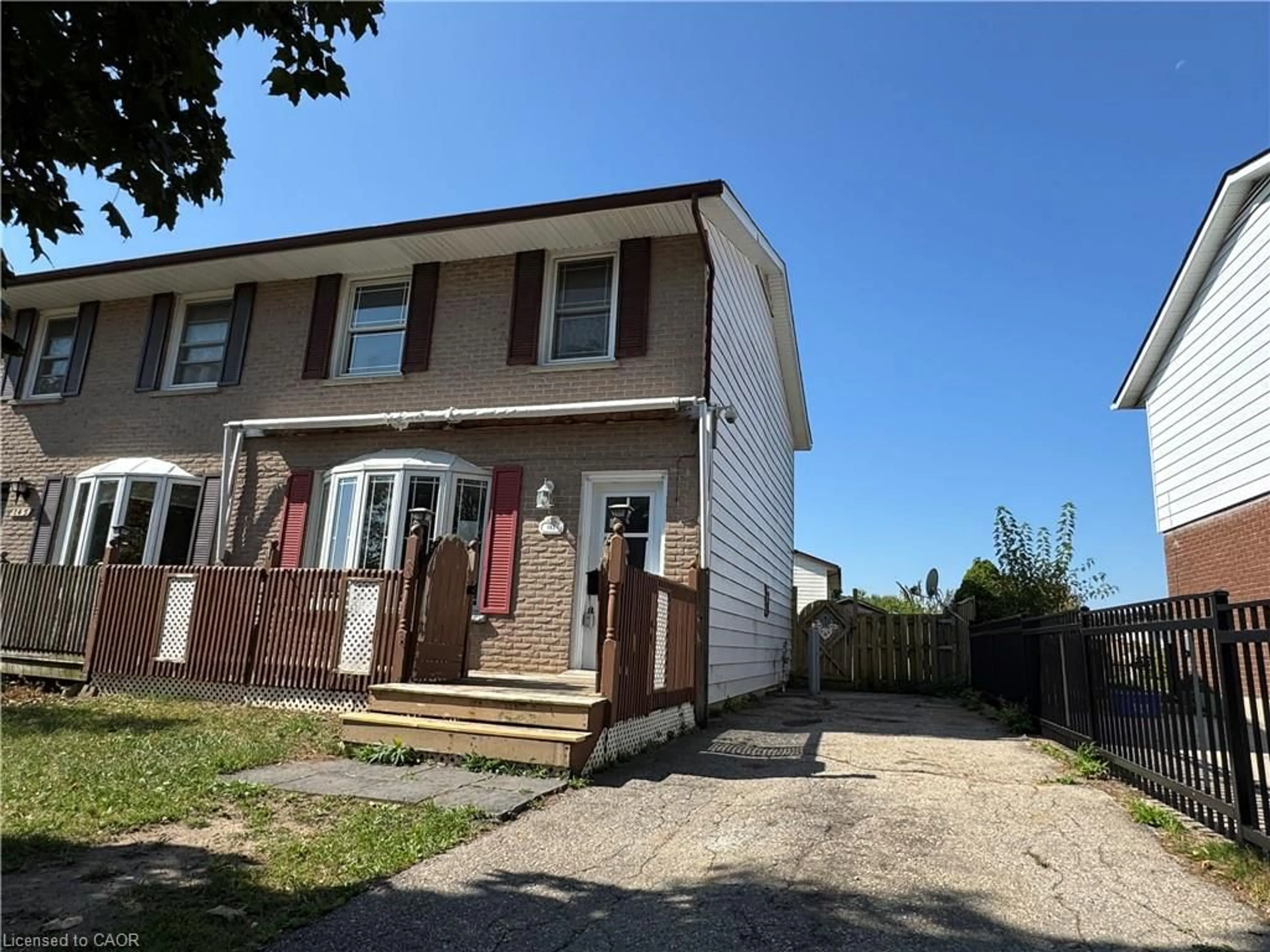 Home with vinyl exterior material, street for 143 Rouse Ave, Cambridge Ontario N1R 4M9