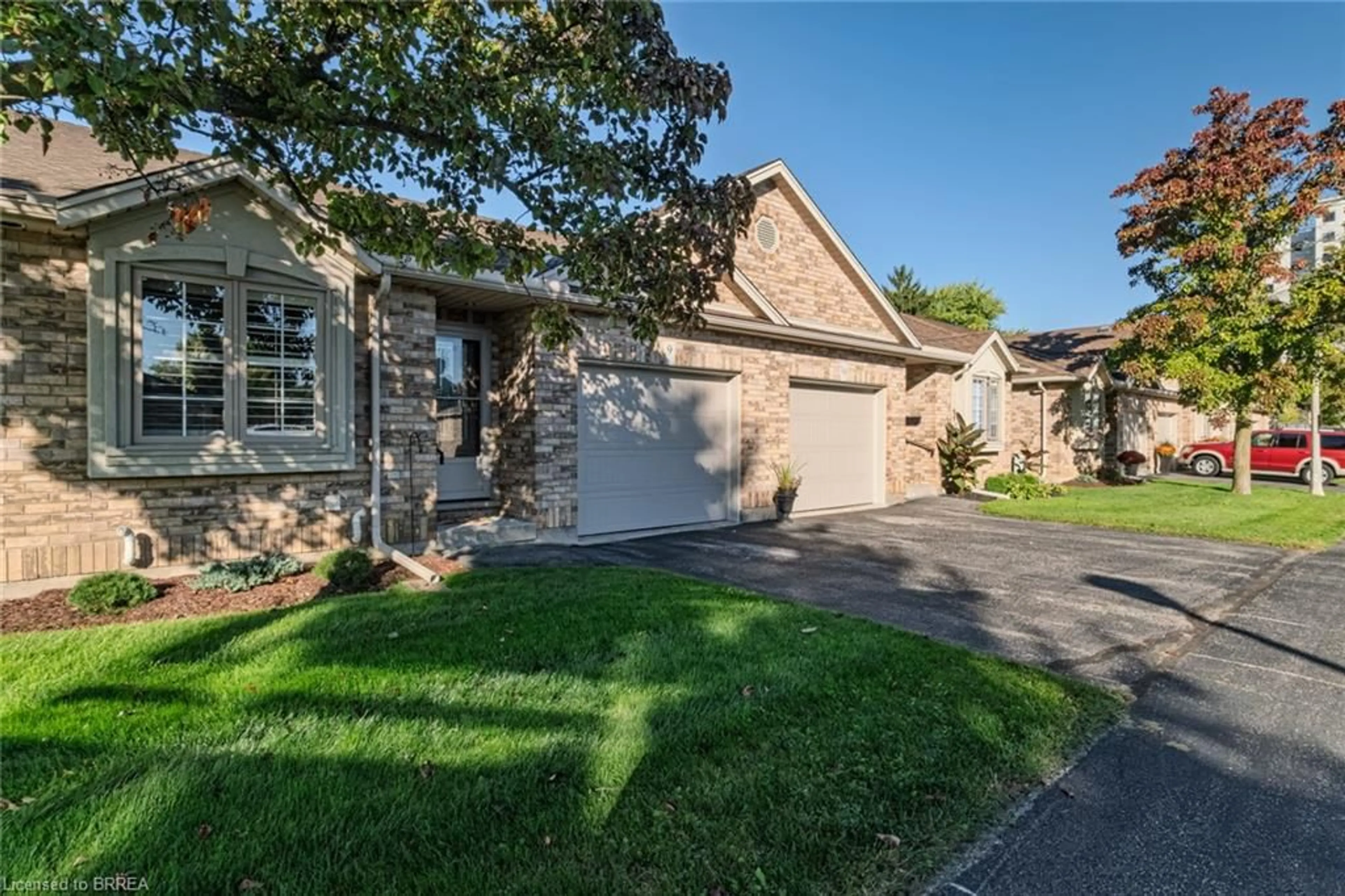 Home with brick exterior material, street for 110 Somerset Rd #9, Brantford Ontario N3R 5A8