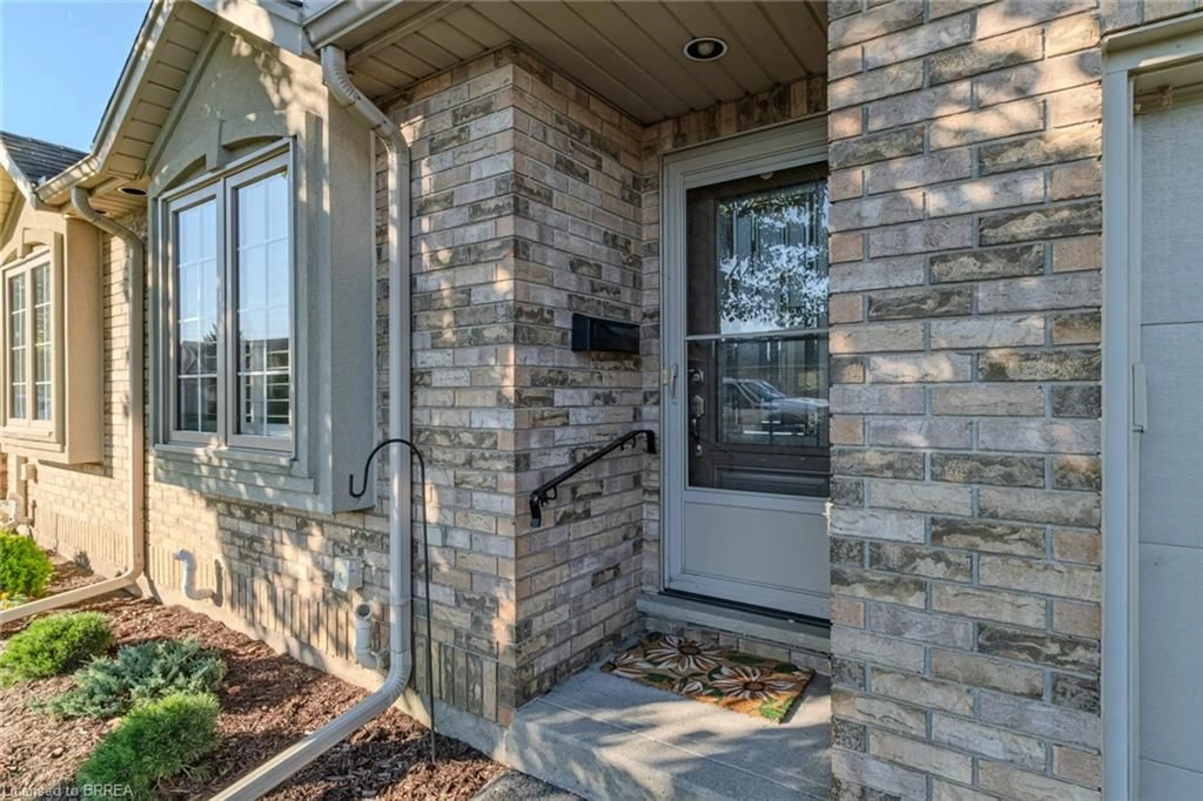 Home with brick exterior material, street for 110 Somerset Rd #9, Brantford Ontario N3R 5A8