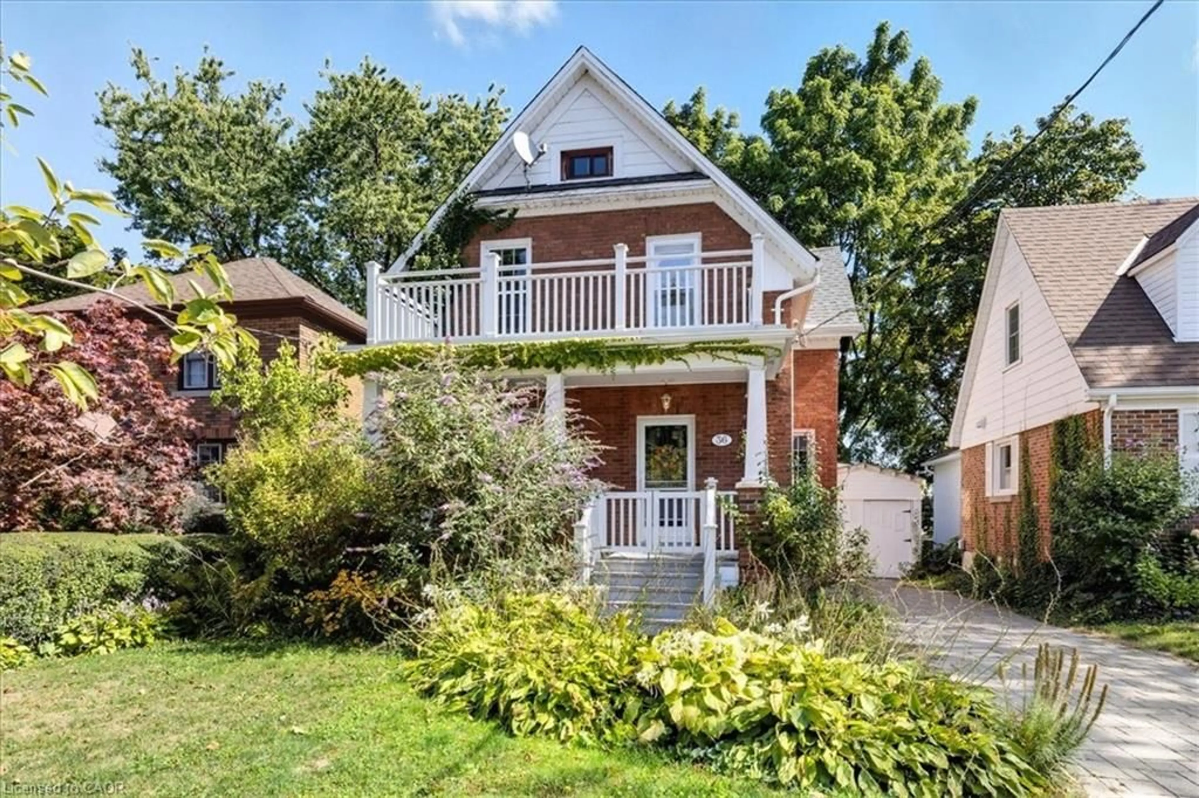 Home with brick exterior material, street for 36 Earl St, Kitchener Ontario N2M 2V6