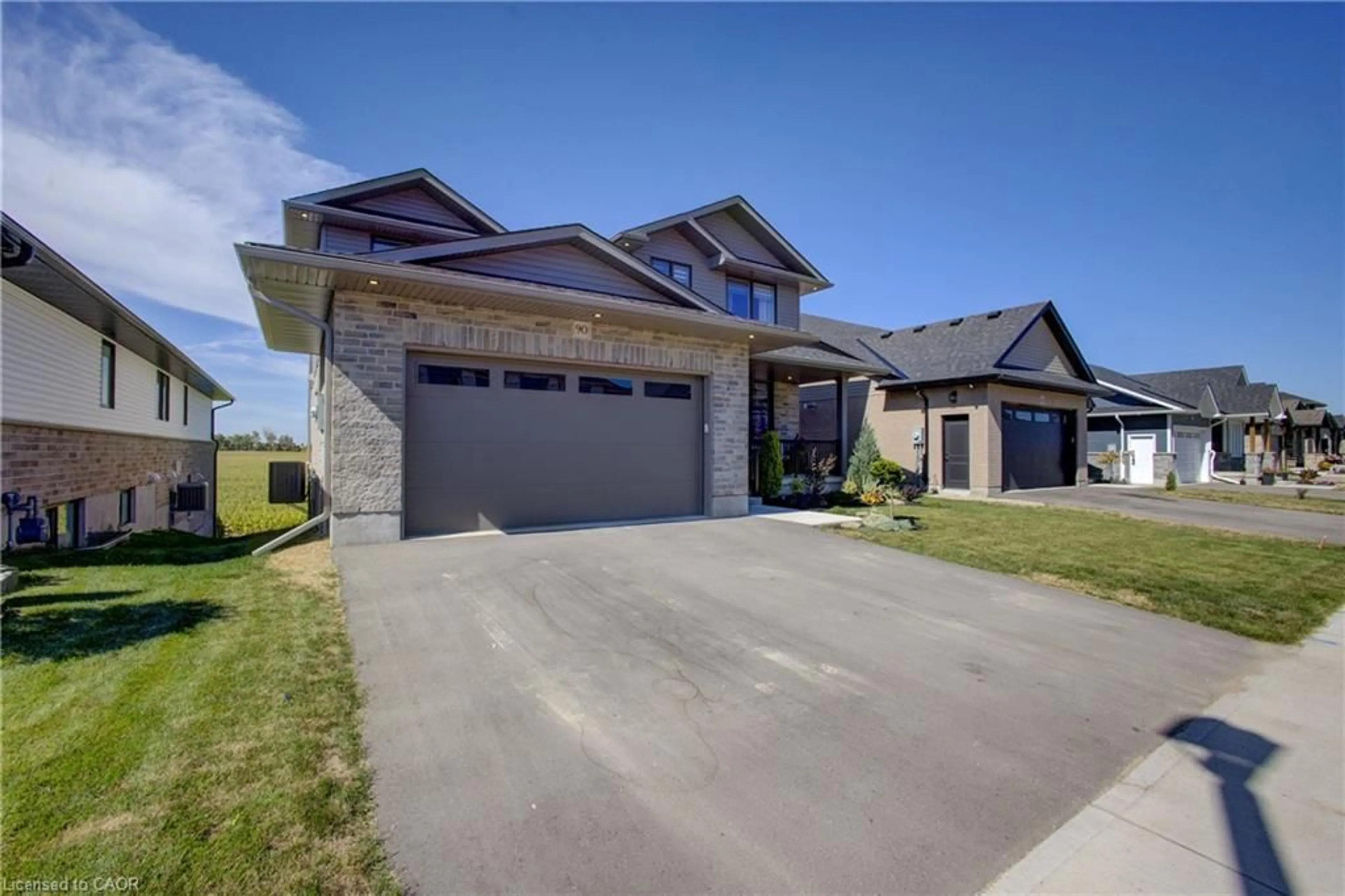 Home with brick exterior material, street for 90 Rea Dr, Fergus Ontario N1M 0J1