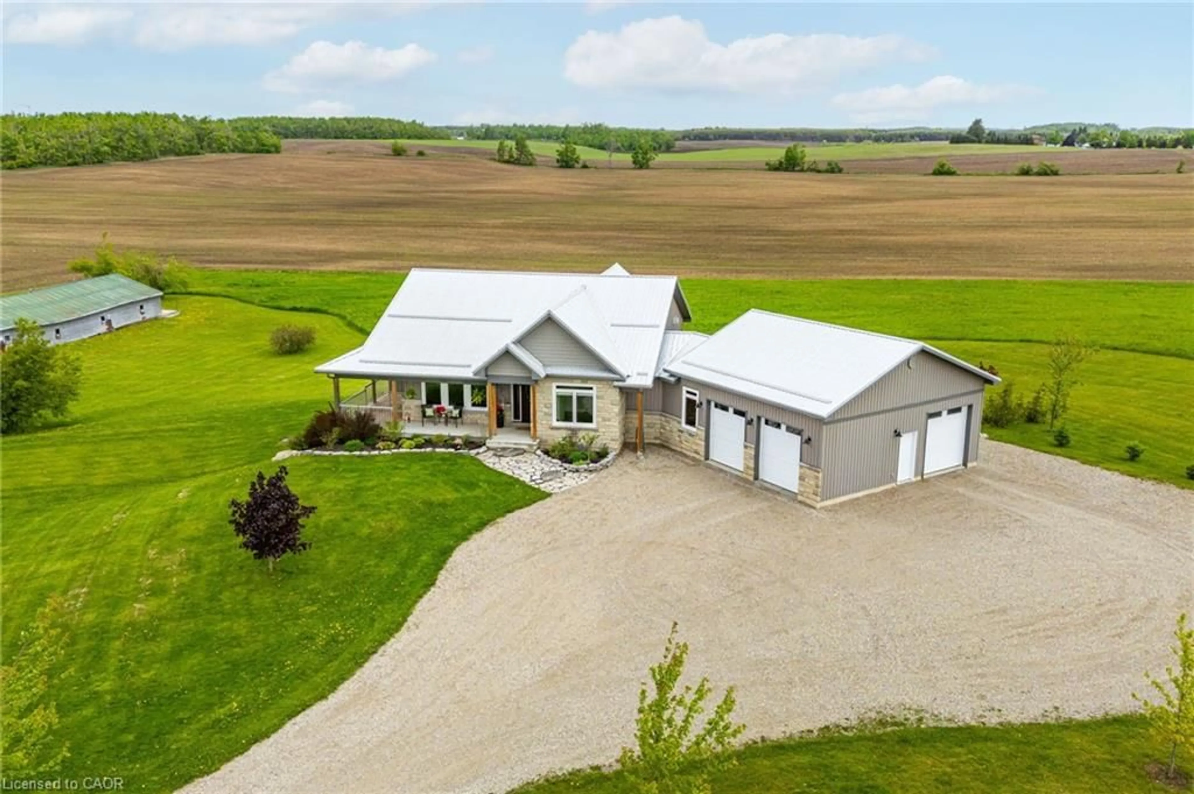 A pic from outside/outdoor area/front of a property/back of a property/a pic from drone, building for 706249 County Rd 21, Mulmur Ontario L9V 0W4