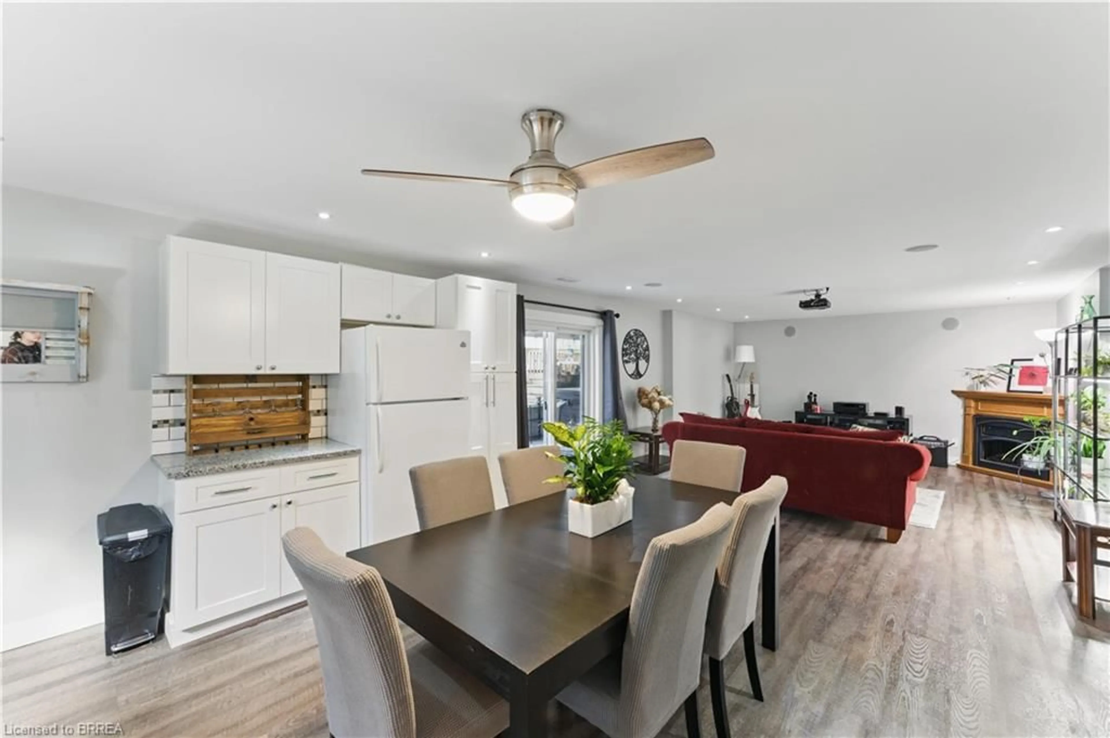 Open concept kitchen, wood/laminate floor for 13 King William St, St. George Ontario N0E 1N0