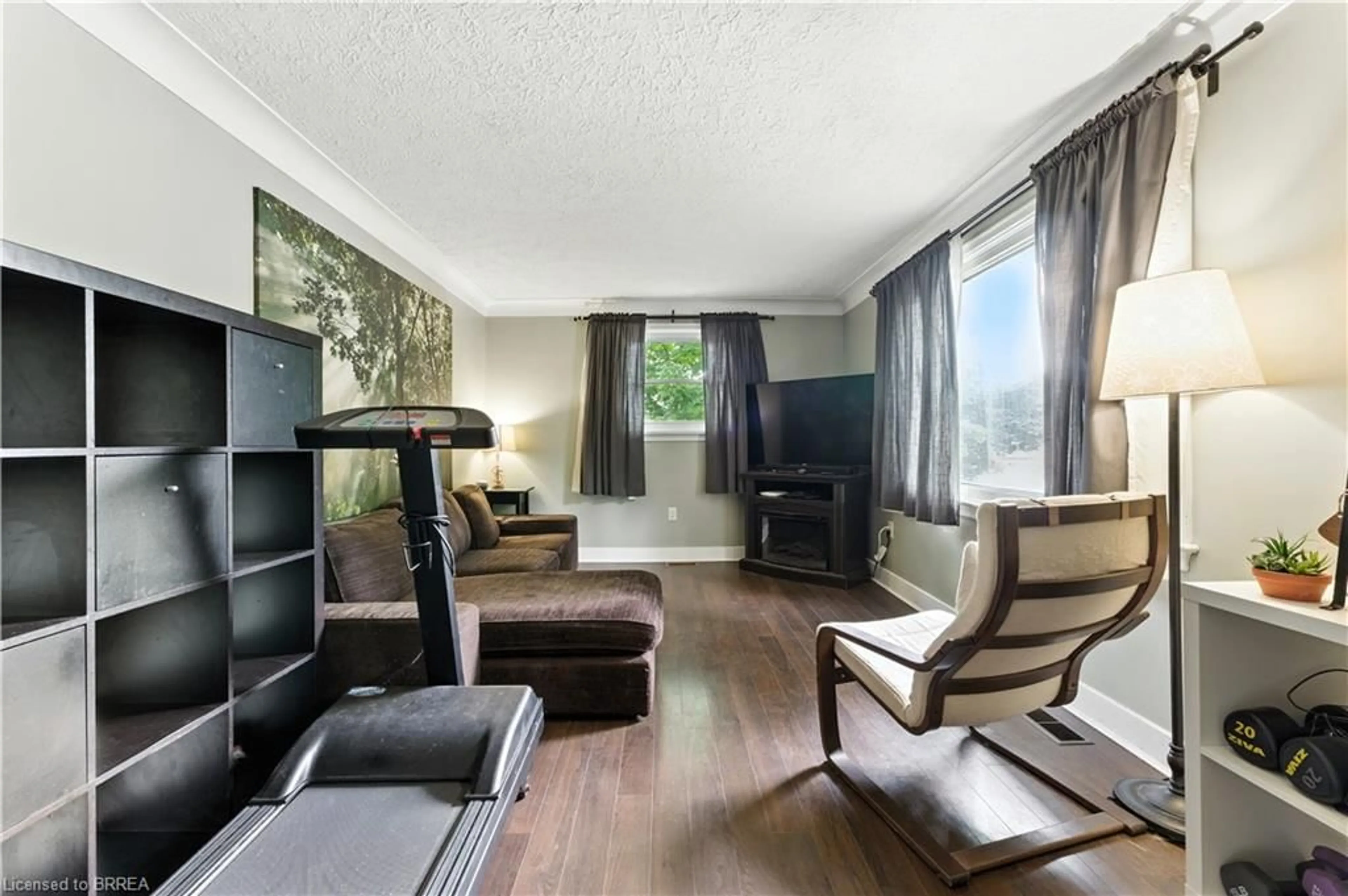 Living room with furniture, wood/laminate floor for 30 Main St, St. George Ontario N0E 1N0