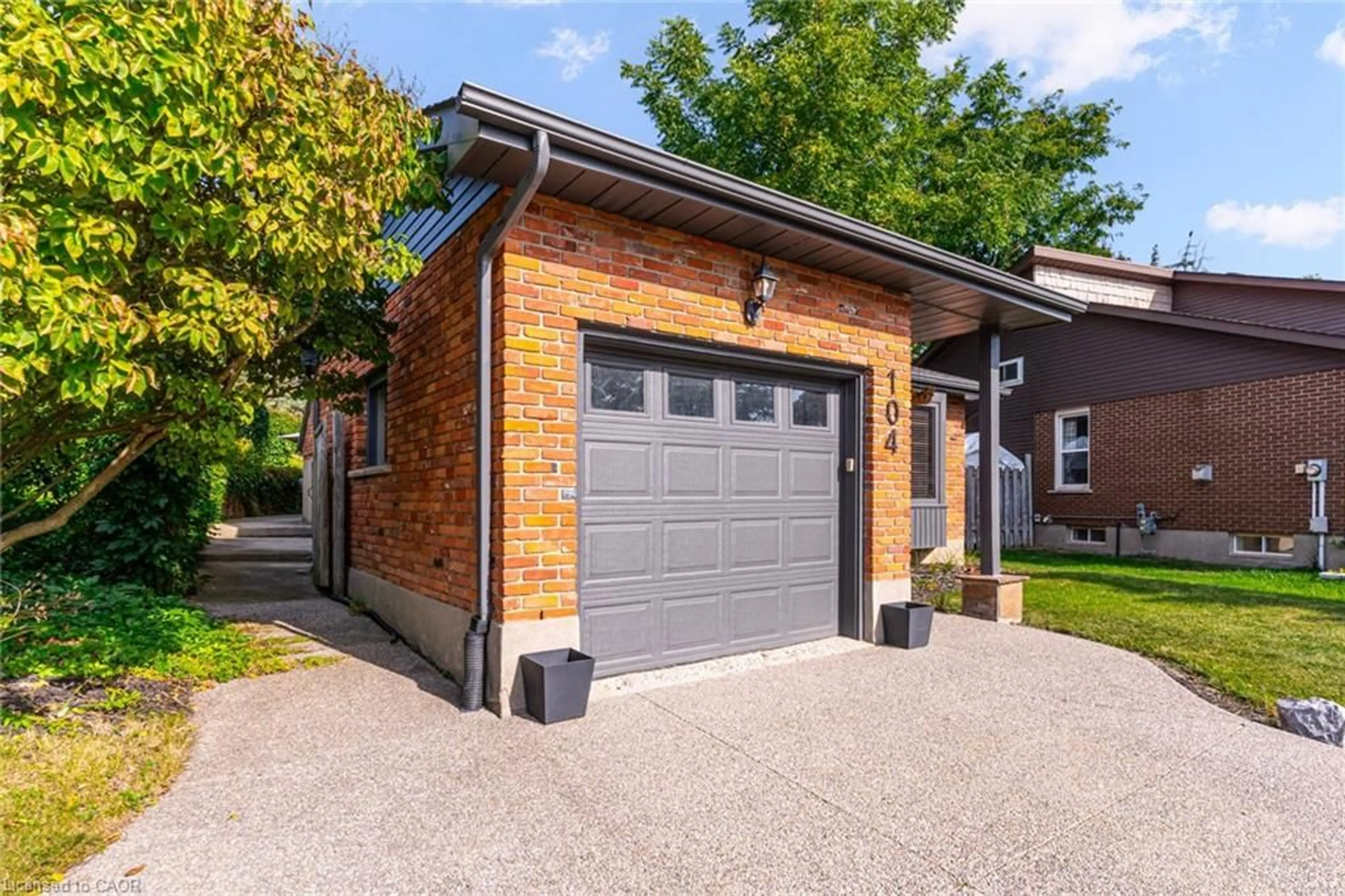 Home with brick exterior material, street for 104 Homeview Pl, Waterloo Ontario N2T 1A4