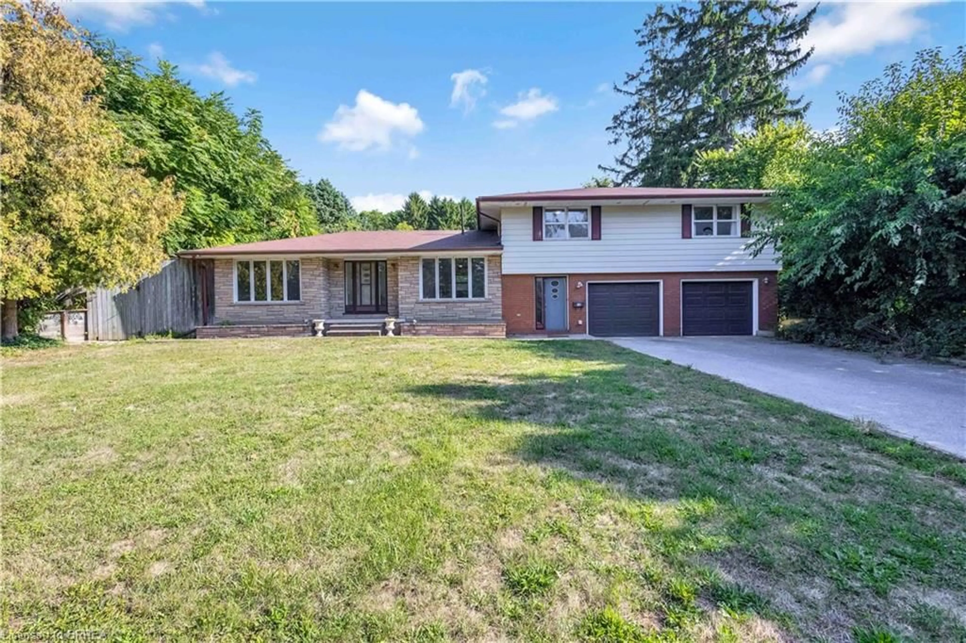 Home with brick exterior material, street for 10 Harris Ave, Brantford Ontario N3R 2E9