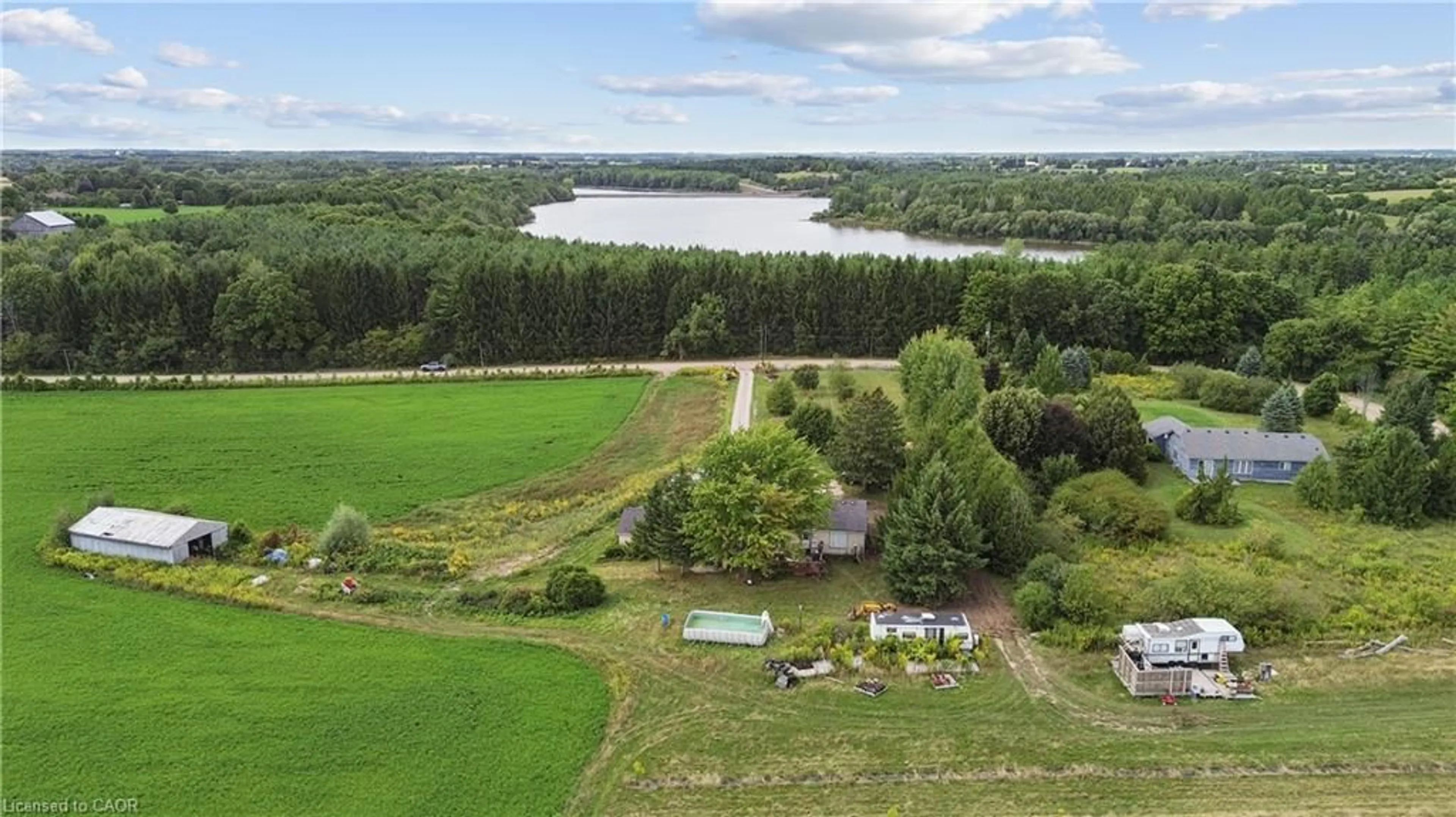 A pic from outside/outdoor area/front of a property/back of a property/a pic from drone, water/lake/river/ocean view for 8033 Sideroad 10, Guelph Ontario N1H 6J1