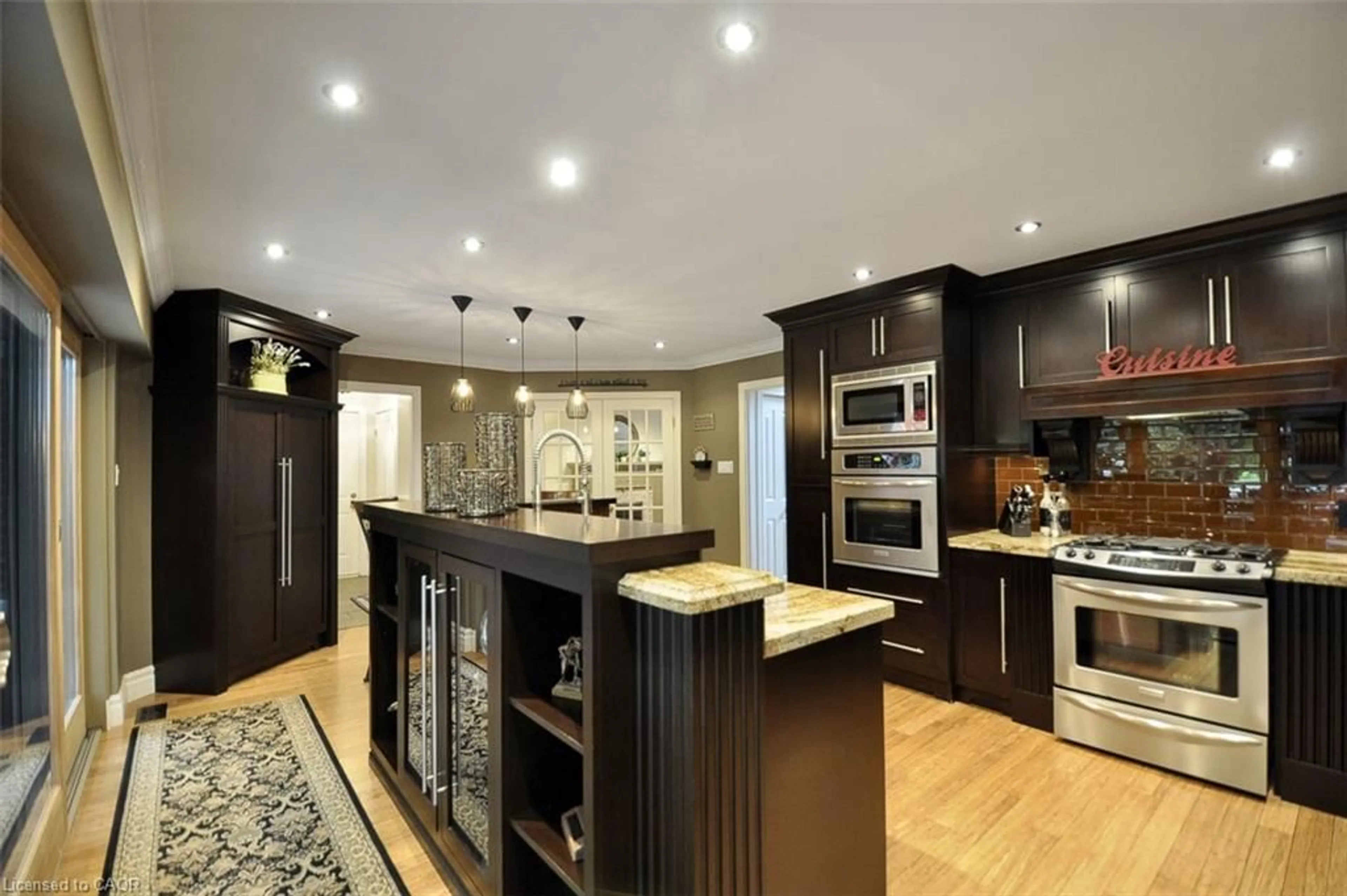 Contemporary kitchen, wood/laminate floor for 481 Mill Park Dr, Kitchener Ontario N2P 2L4