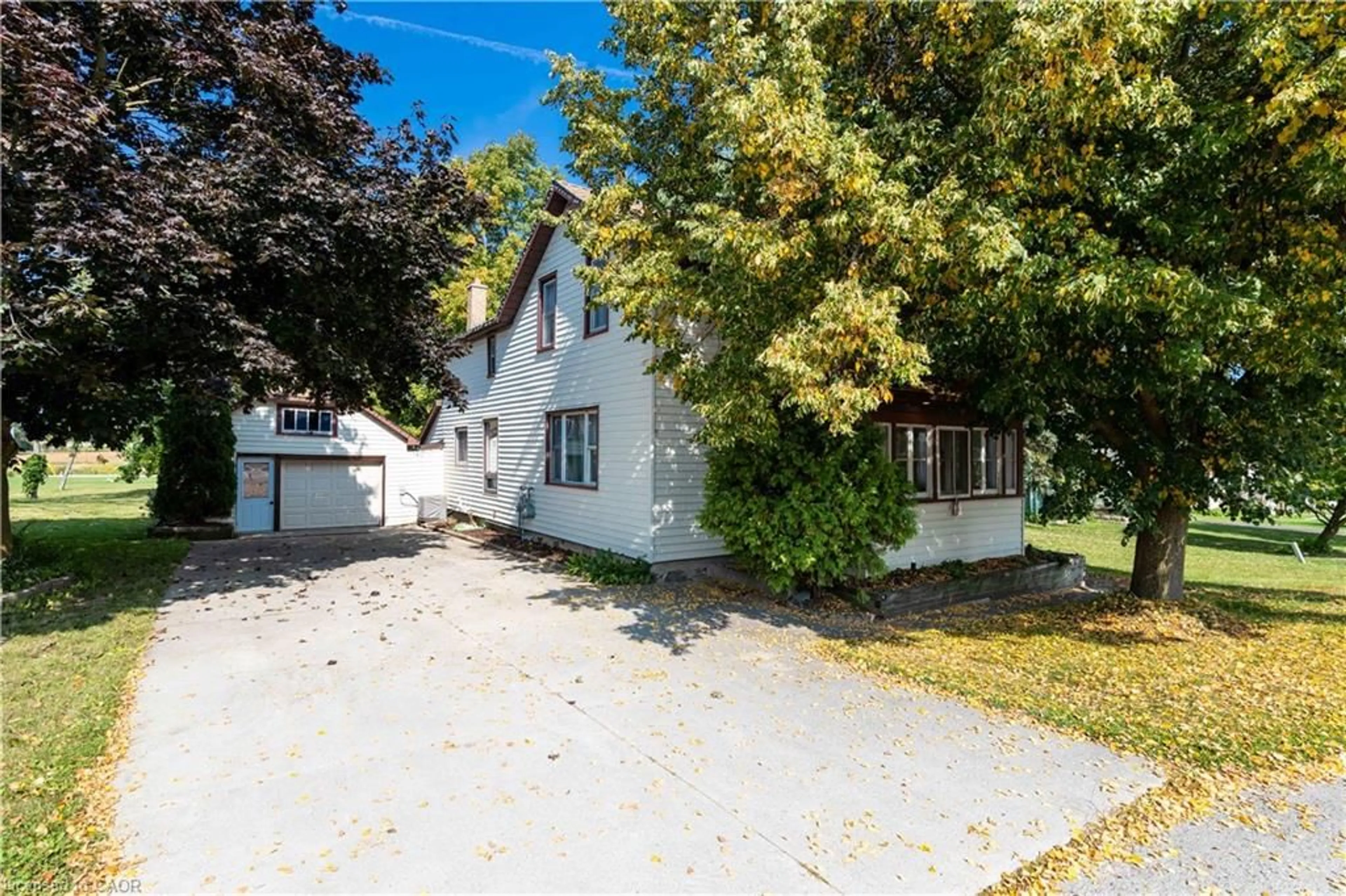 A pic from outside/outdoor area/front of a property/back of a property/a pic from drone, street for 84 Absalom St W St, Mildmay Ontario N0G 2J0