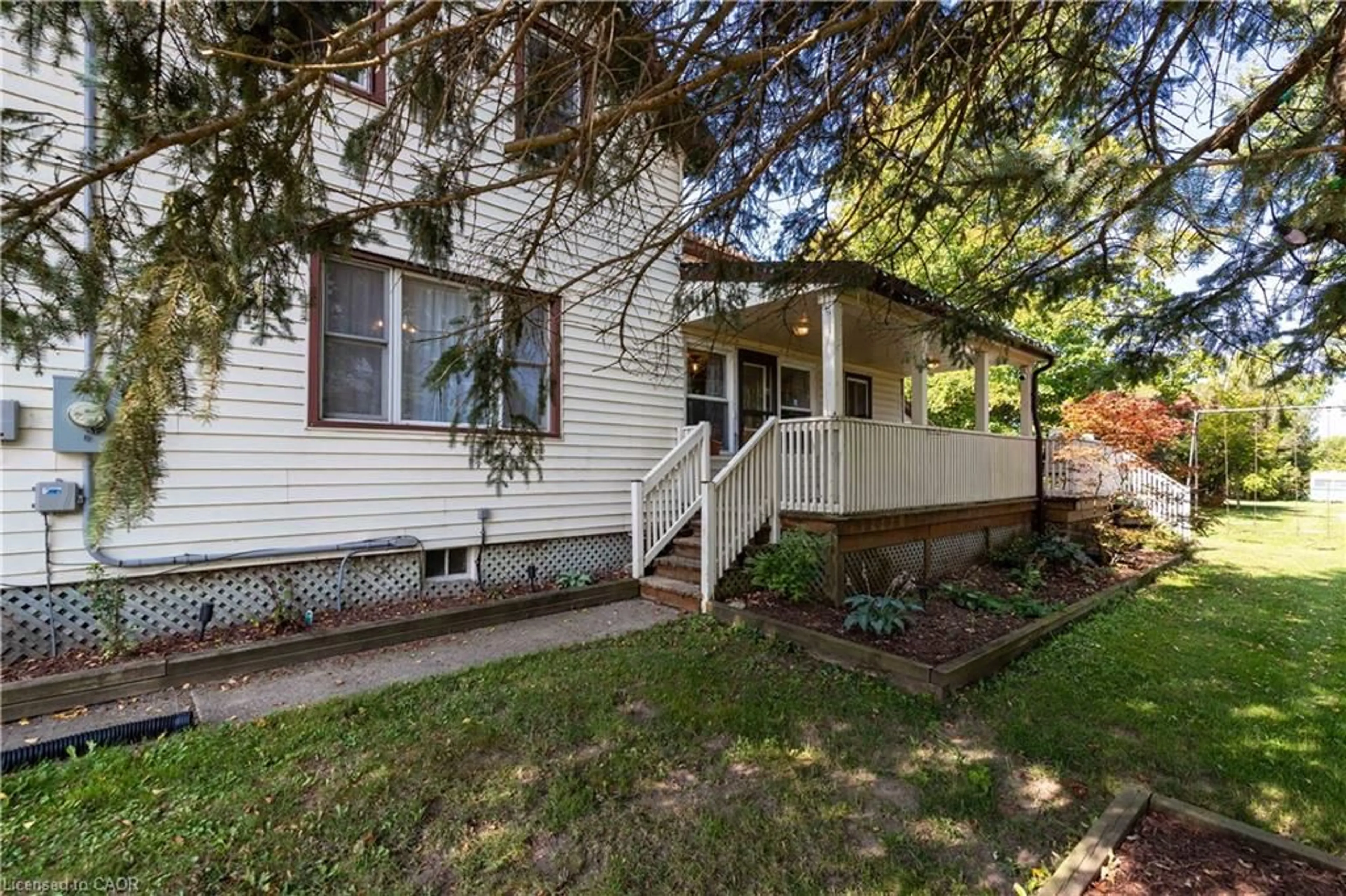 Home with vinyl exterior material, street for 84 Absalom St W St, Mildmay Ontario N0G 2J0