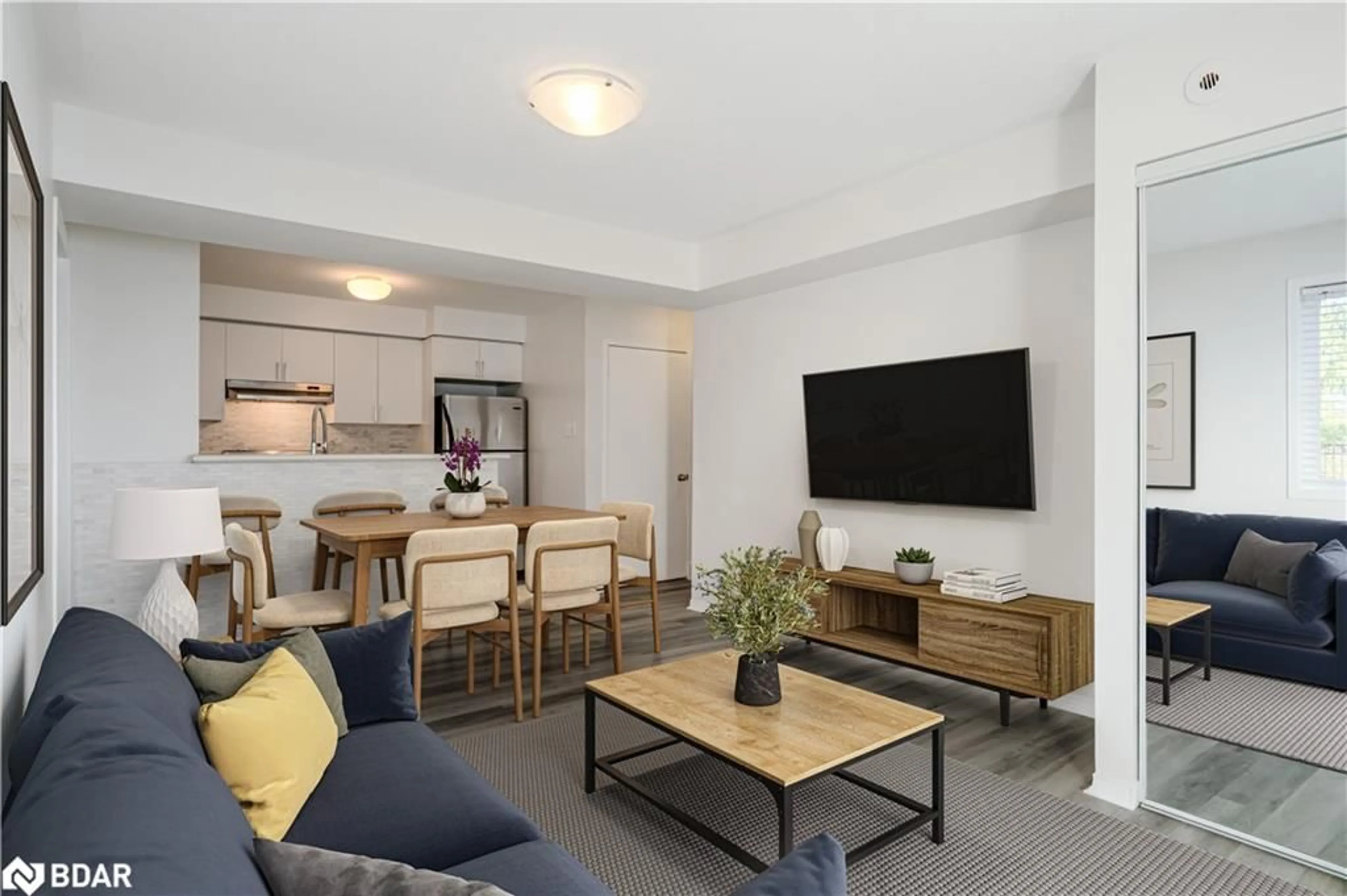 Living room with furniture, unknown for 4975 Southampton Dr #327, Mississauga Ontario L5M 8C5