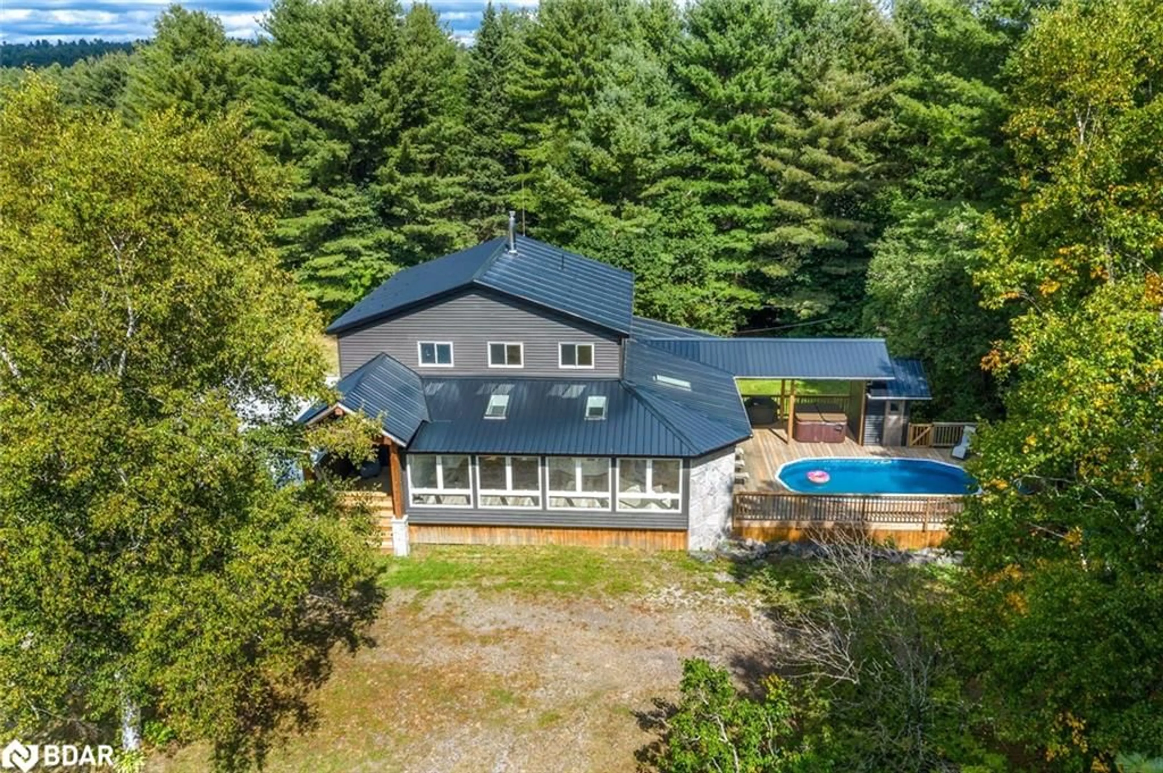 A pic from outside/outdoor area/front of a property/back of a property/a pic from drone, water/lake/river/ocean view for 259 Nippissing Rd, Seguin Ontario P0C 1J0