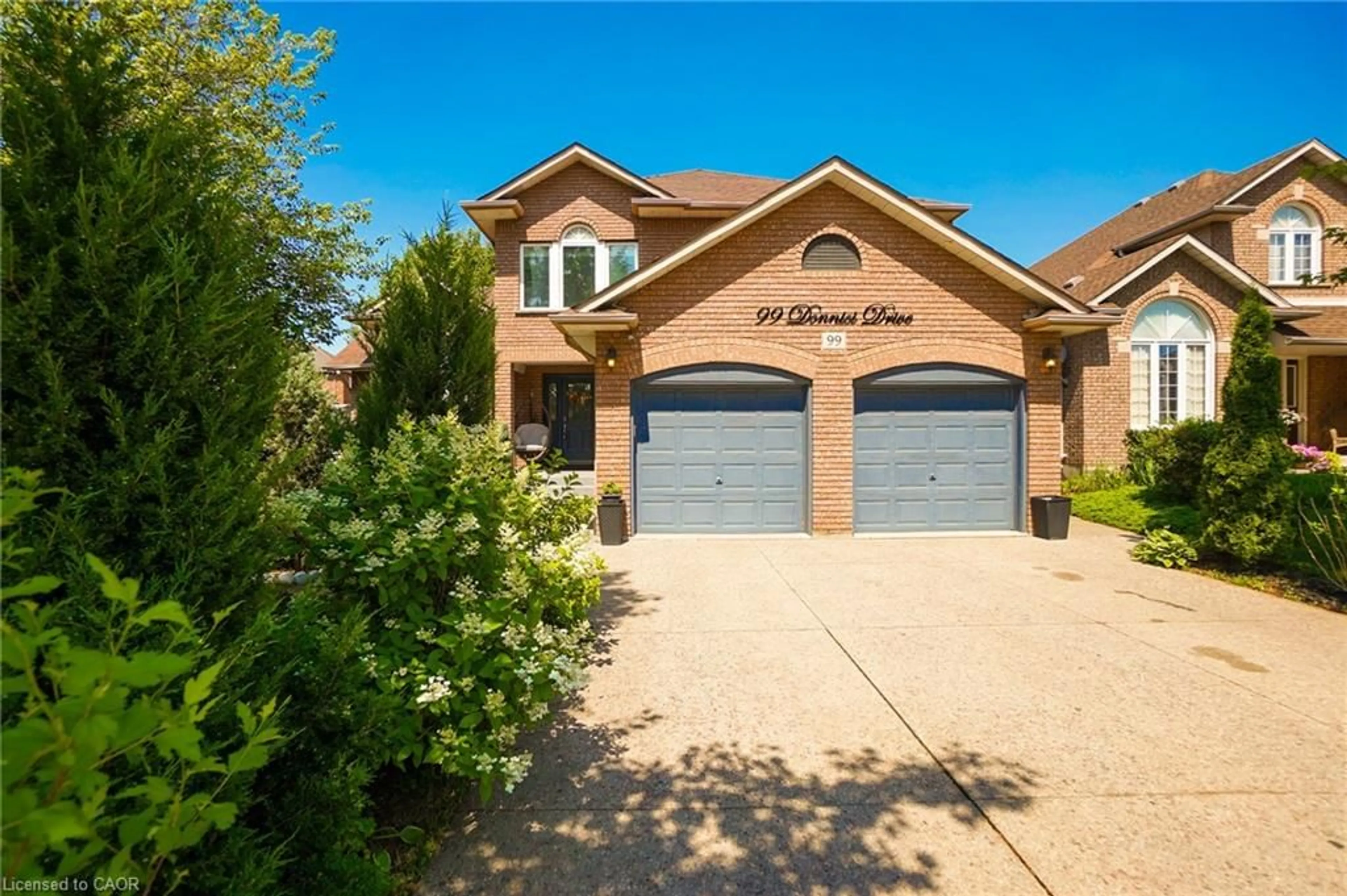 Home with brick exterior material, street for 99 Donnici Dr, Hamilton Ontario L9B 2K3