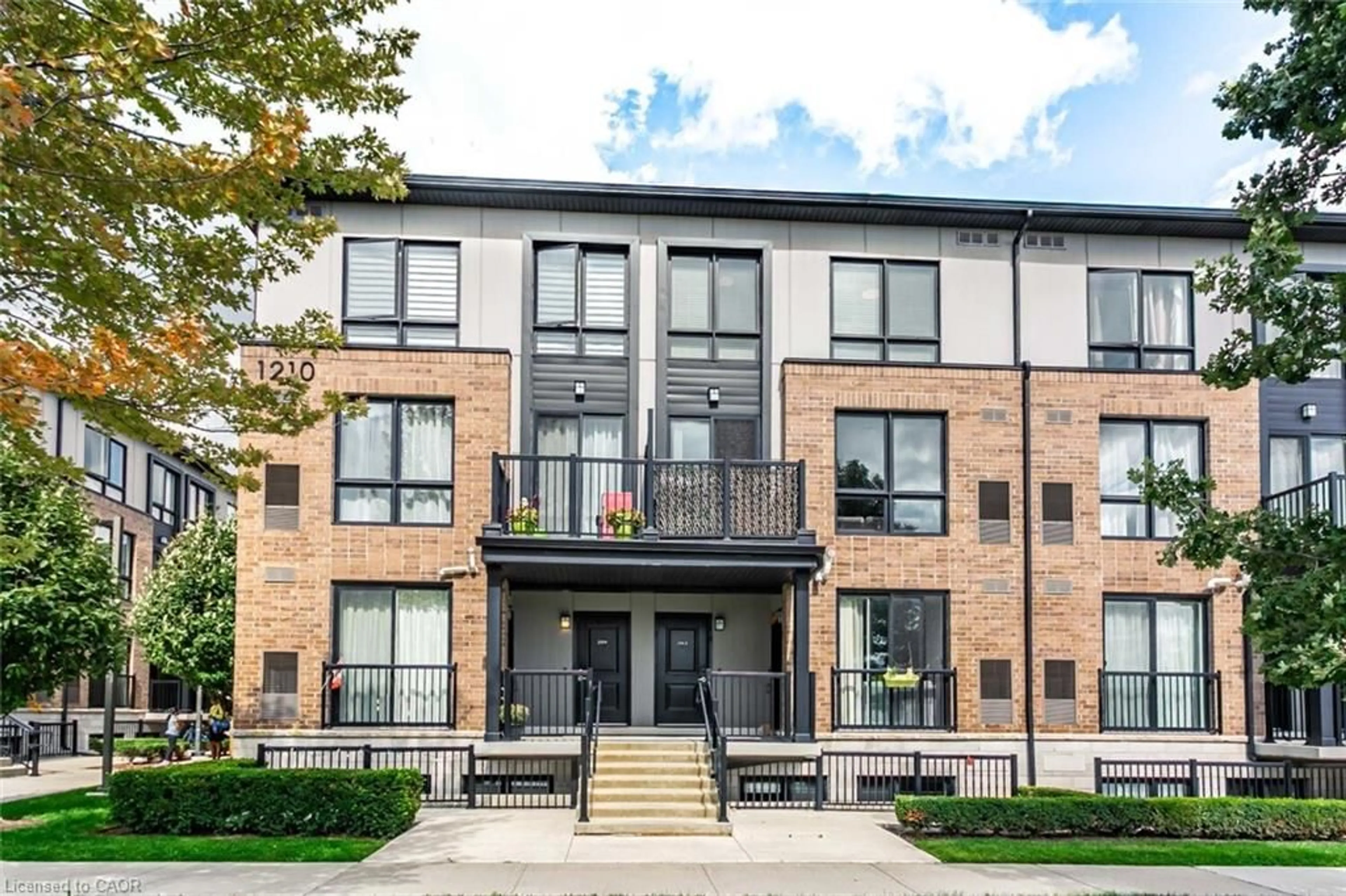 Home with brick exterior material, street for 1210 Main St #203, Milton Ontario L9T 9K8