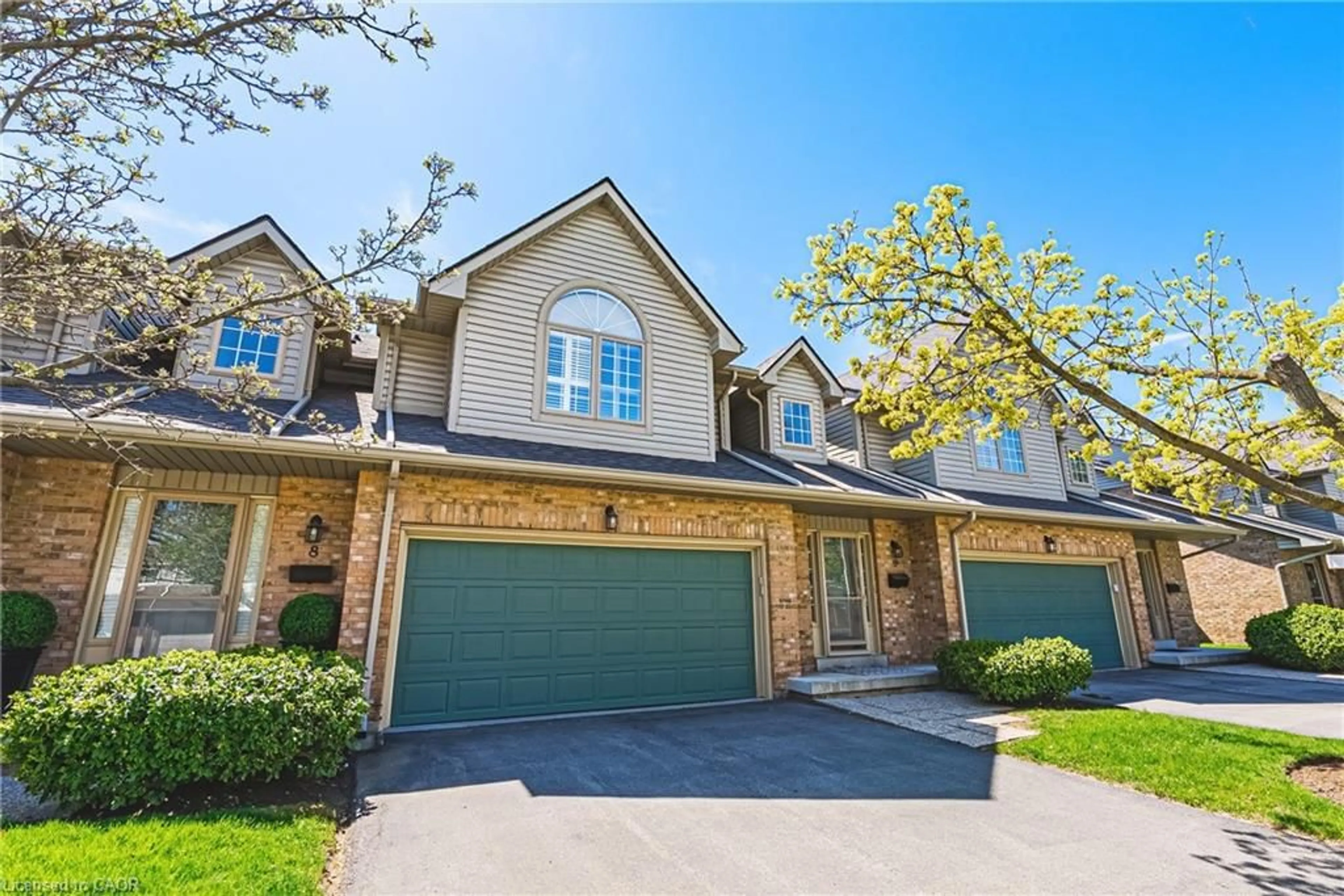 Home with brick exterior material, street for 3333 New St #9, Burlington Ontario L7N 1N1