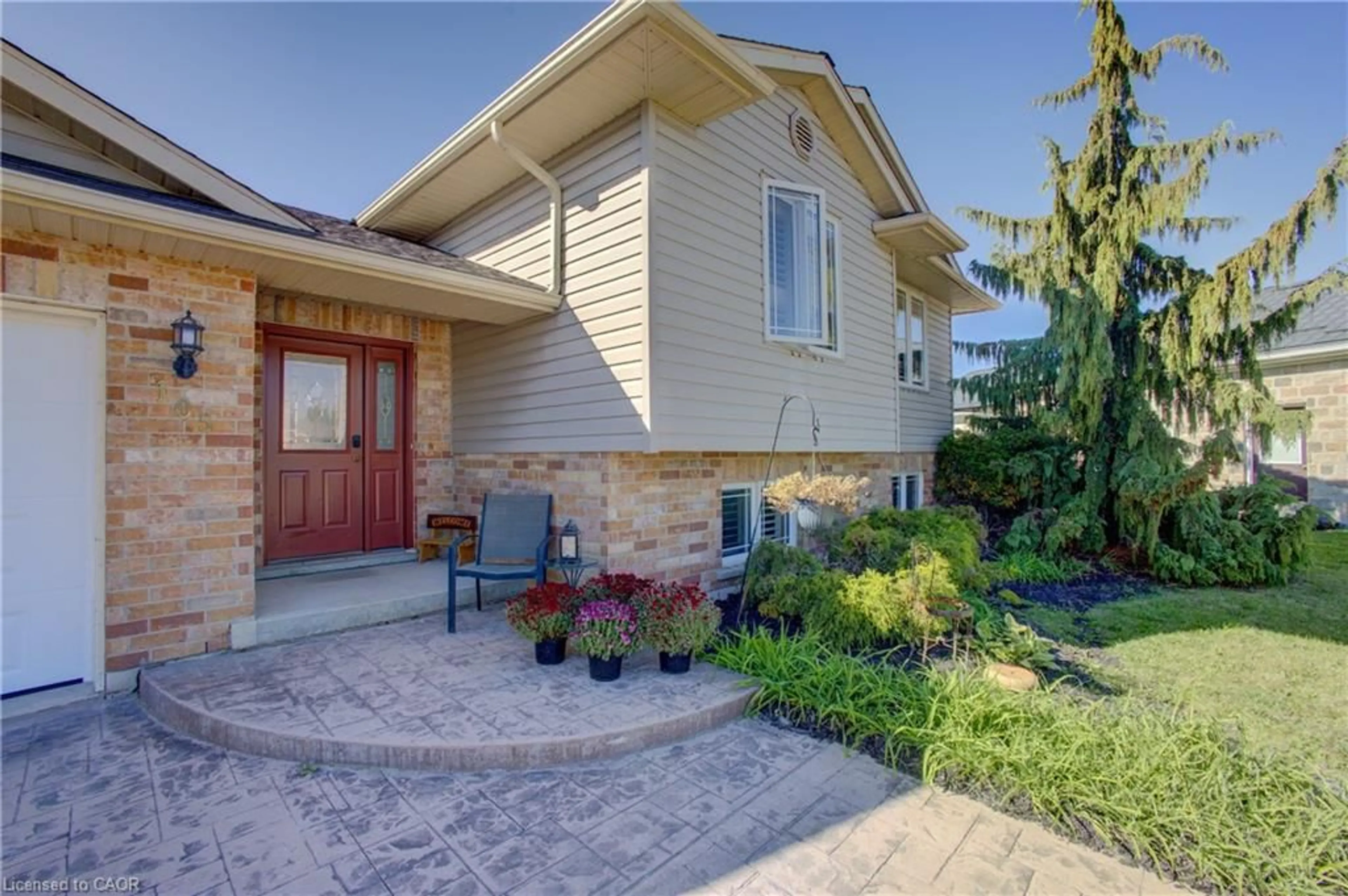 Home with brick exterior material, street for 105 Connery Rd, Mount Forest Ontario N0G 2L2