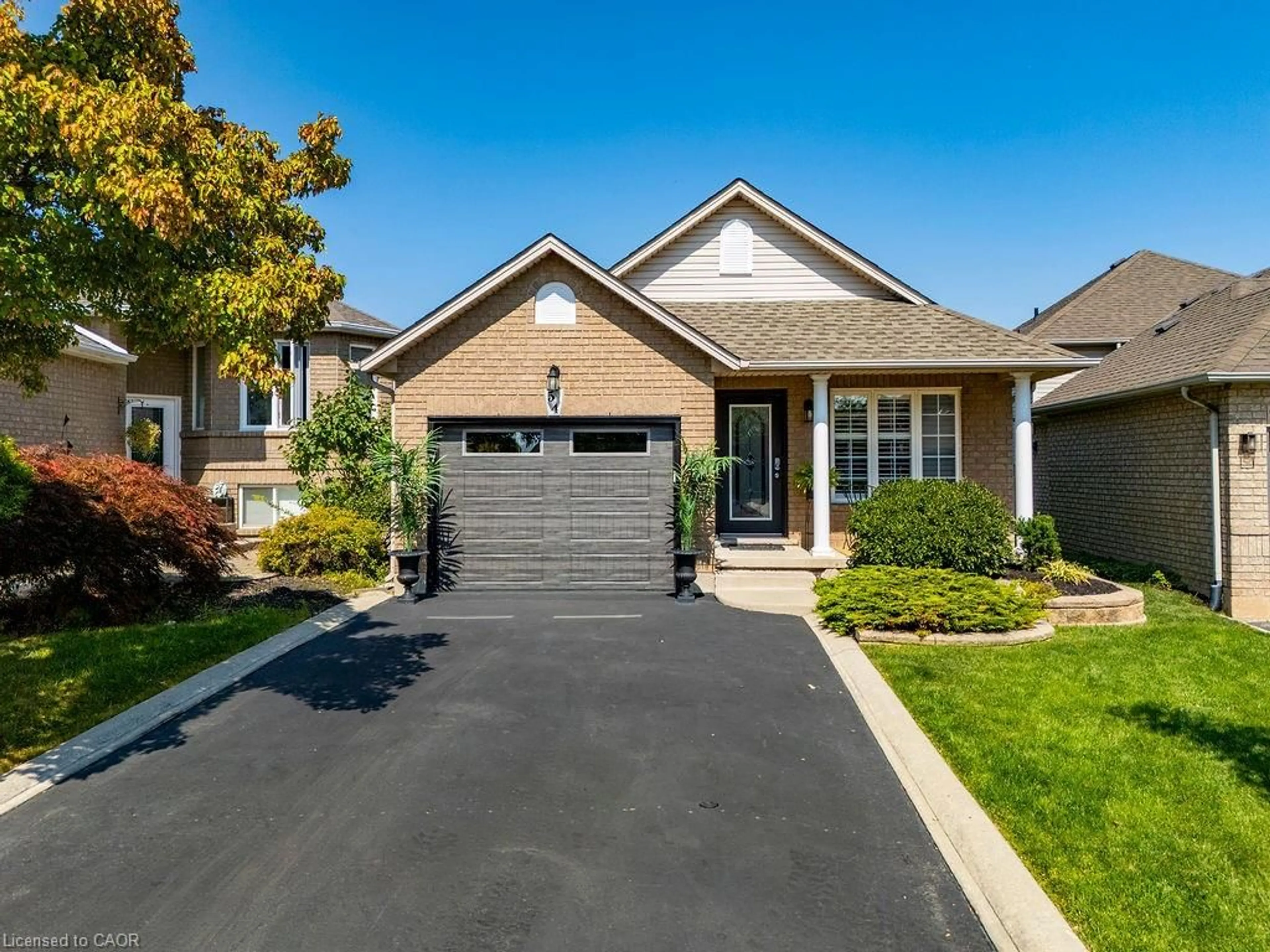 Home with brick exterior material, street for 54 Briarose Pl, Hamilton Ontario L9C 7V3